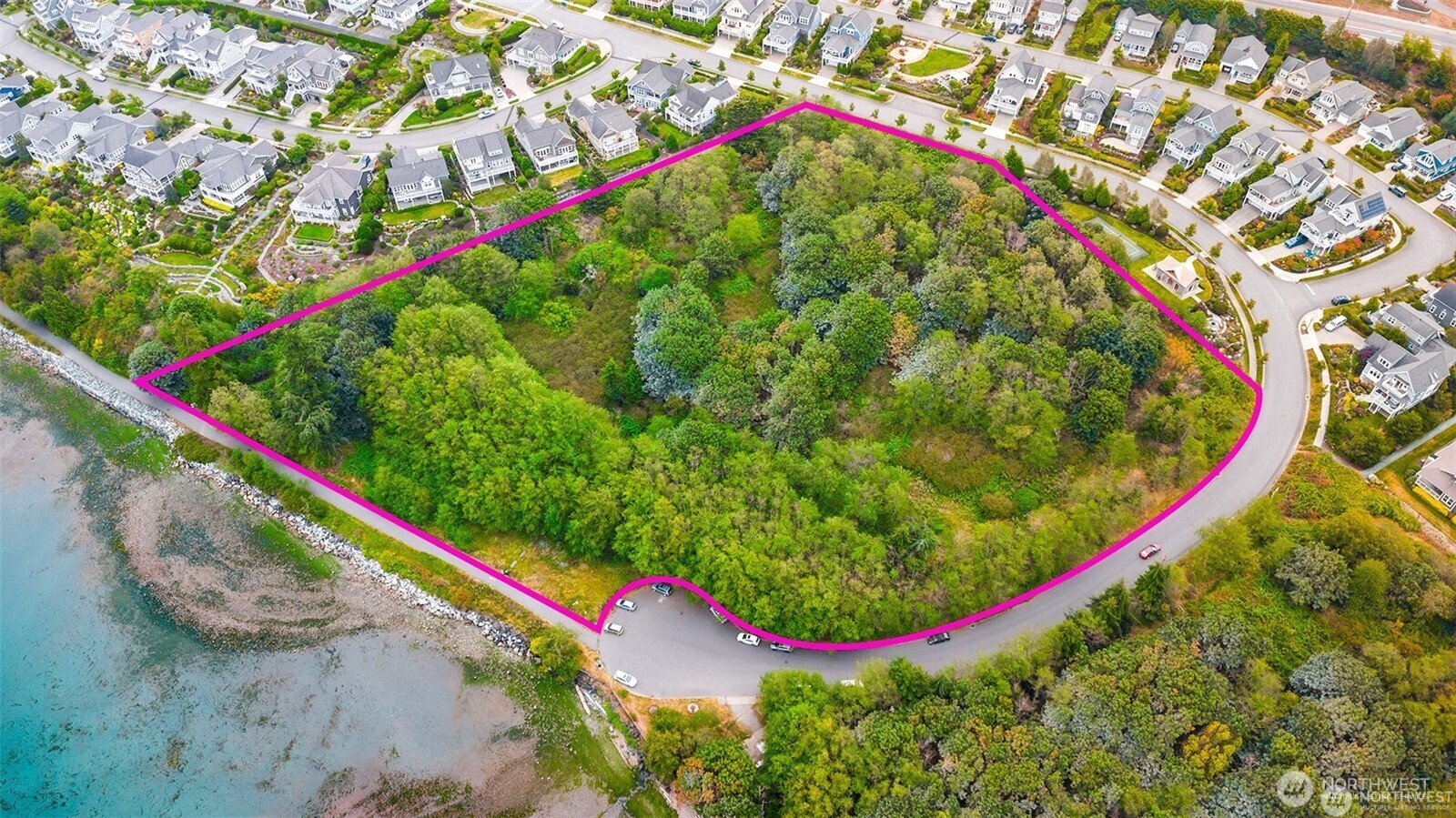 4909 Edwards Way Anacortes, WA 98221 - Photo 7 of 11 a view of a lush green field with plants