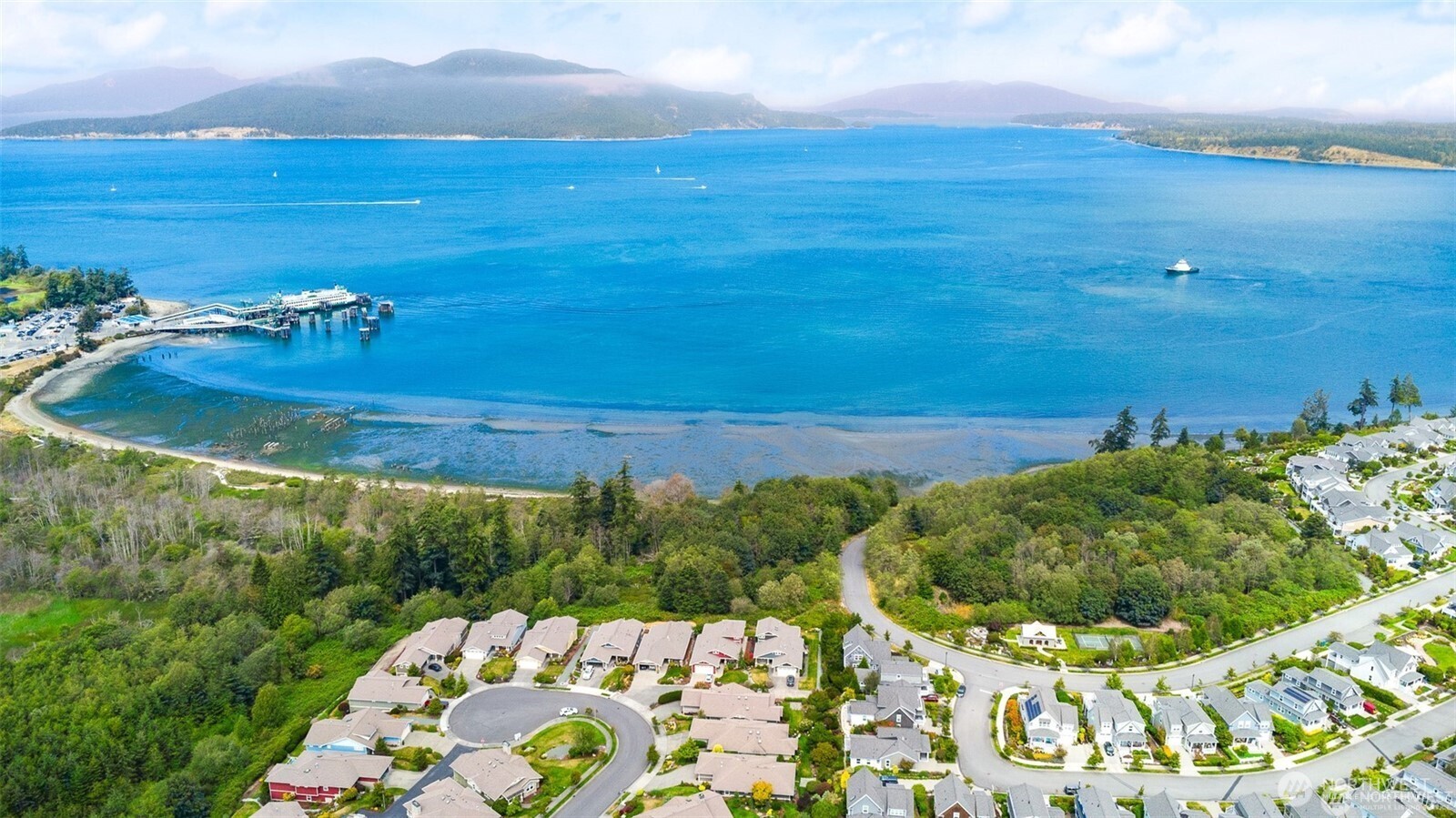4909 Edwards Way Anacortes, WA 98221 - Photo 9 of 11 a view of a lake with an outdoor space