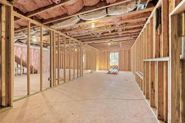 a view of a room with wooden walls