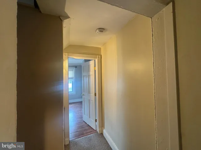 a view of a bathroom with a glass door