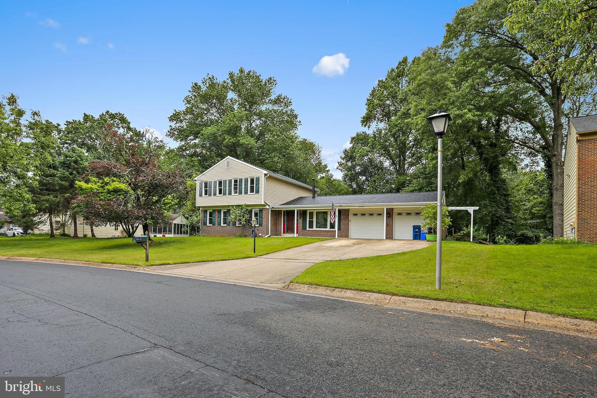 15504 Williston Road Silver Spring, MD 20905 - Photo 2 of 41 a house with trees in the background