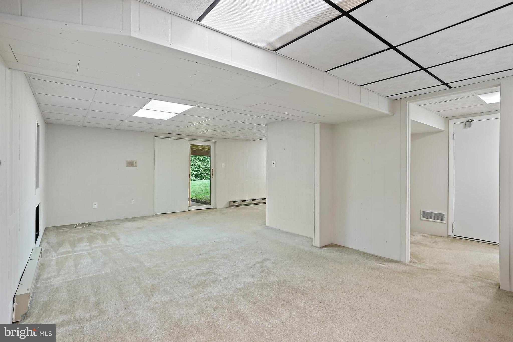 15504 Williston Road Silver Spring, MD 20905 - Photo 29 of 41 a view of a livingroom with an empty space and a window