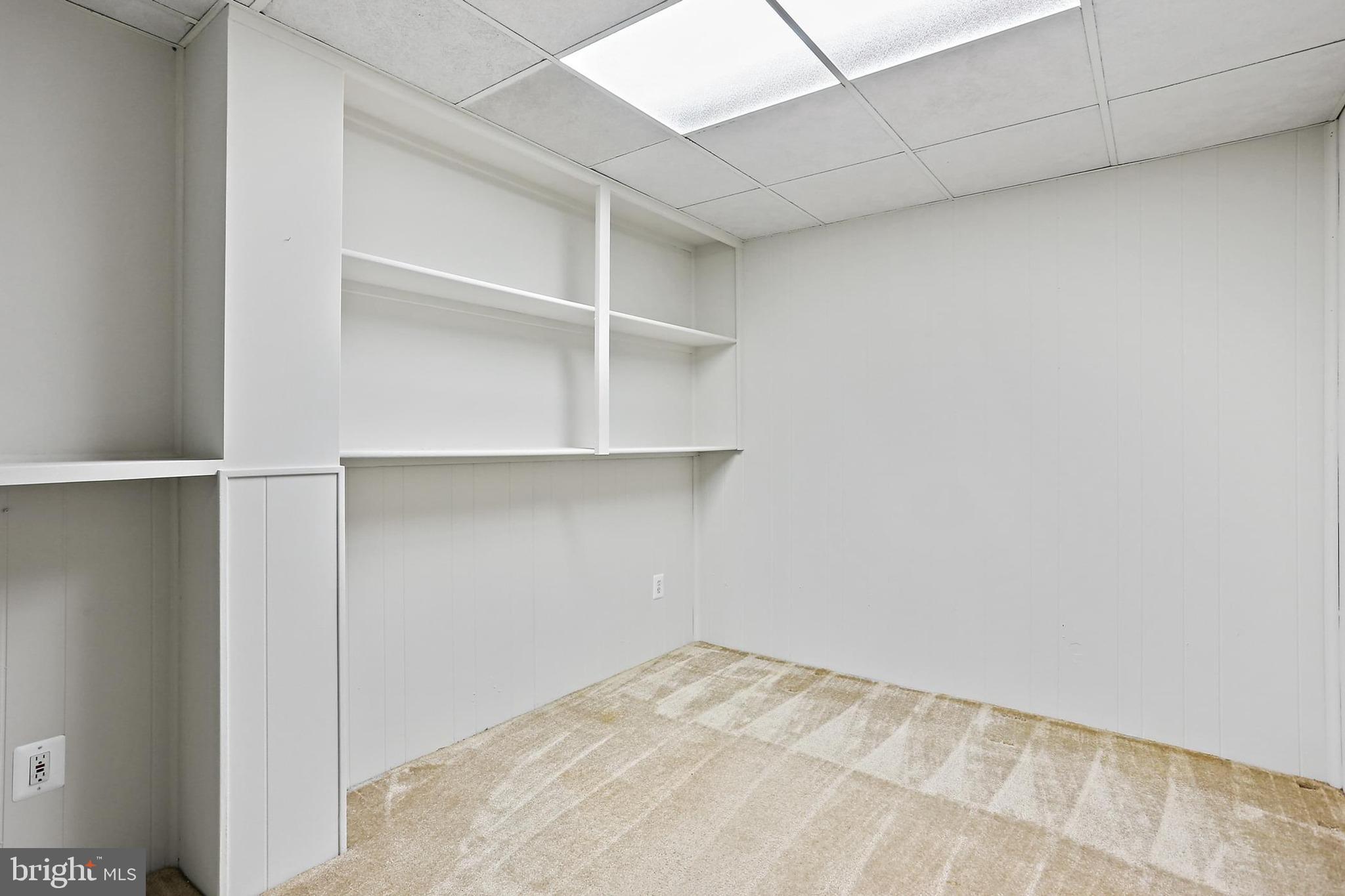 15504 Williston Road Silver Spring, MD 20905 - Photo 34 of 41 a view of a room with shelf on the wall