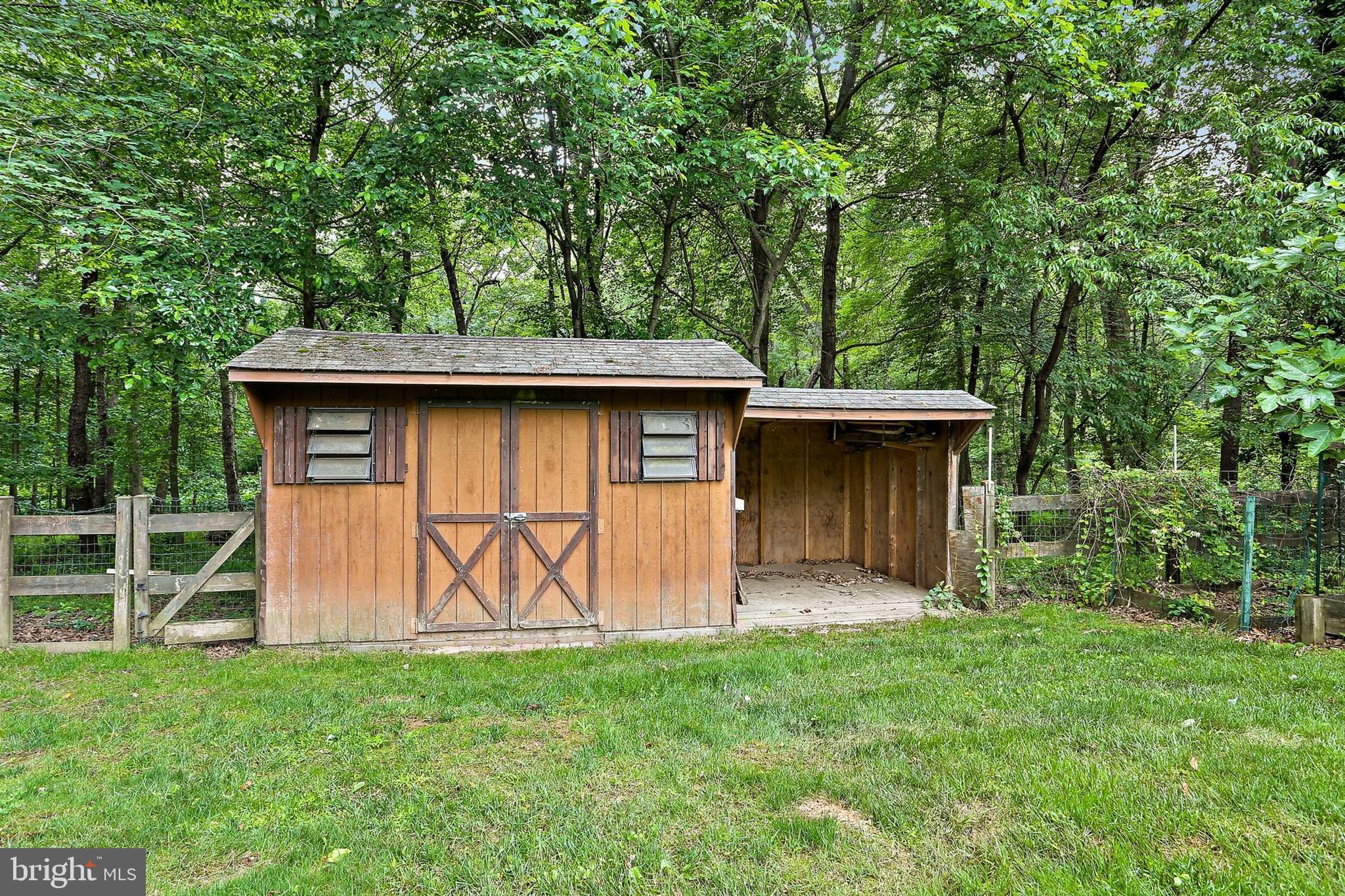 15504 Williston Road Silver Spring, MD 20905 - Photo 40 of 41 a view of a tiny house with a yard