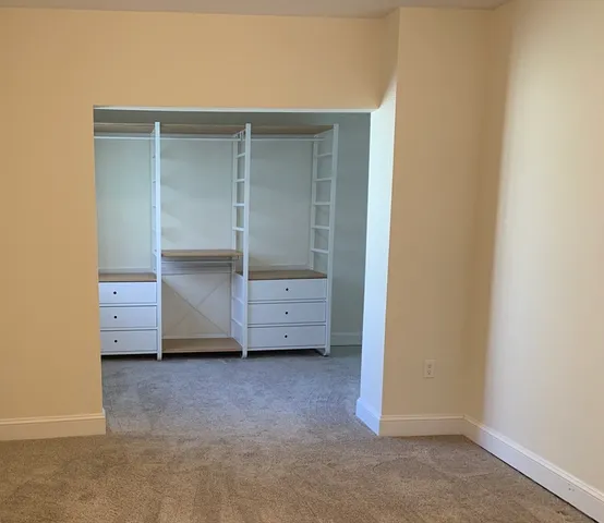 an empty room with closet