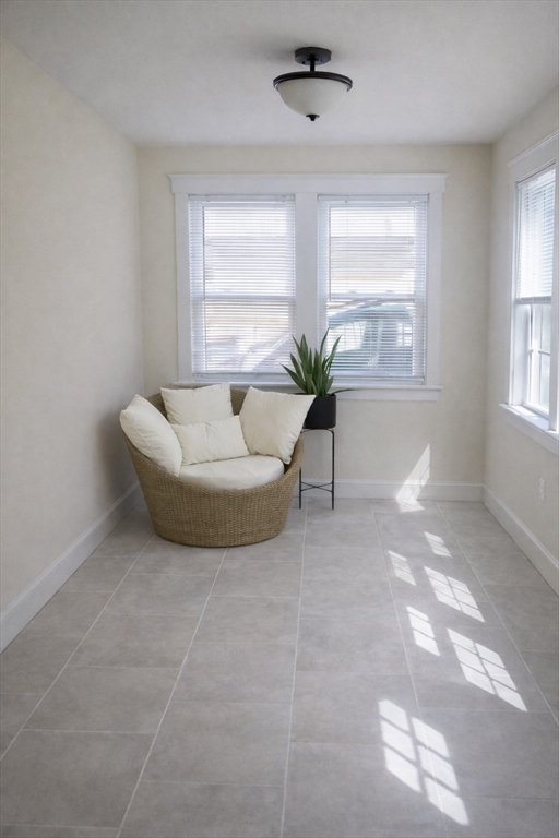 140 Ames Street, Unit 1 Sharon, MA 02067 - Photo 3 of 16 a living room with furniture and a window