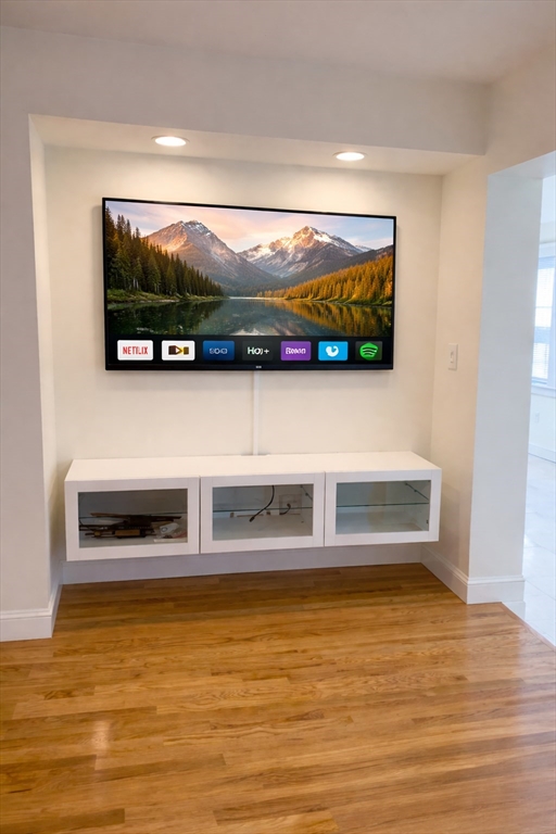 140 Ames Street, Unit 1 Sharon, MA 02067 - Photo 7 of 16 a view of a living room with an ocean view