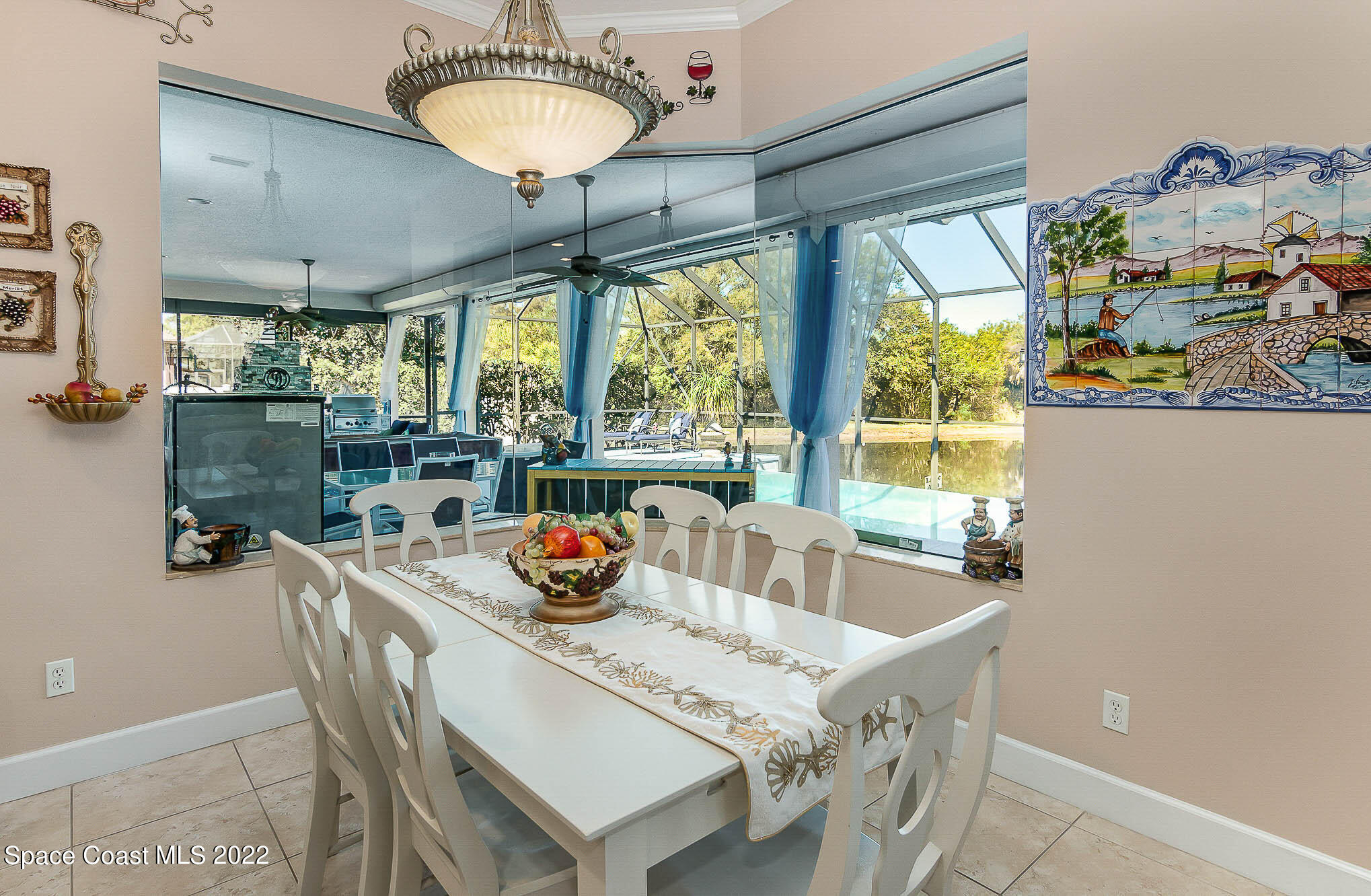 1338 Centennial Way Rockledge, FL 32955 - Photo 18 of 46 a view of a dining room with furniture window and outside view