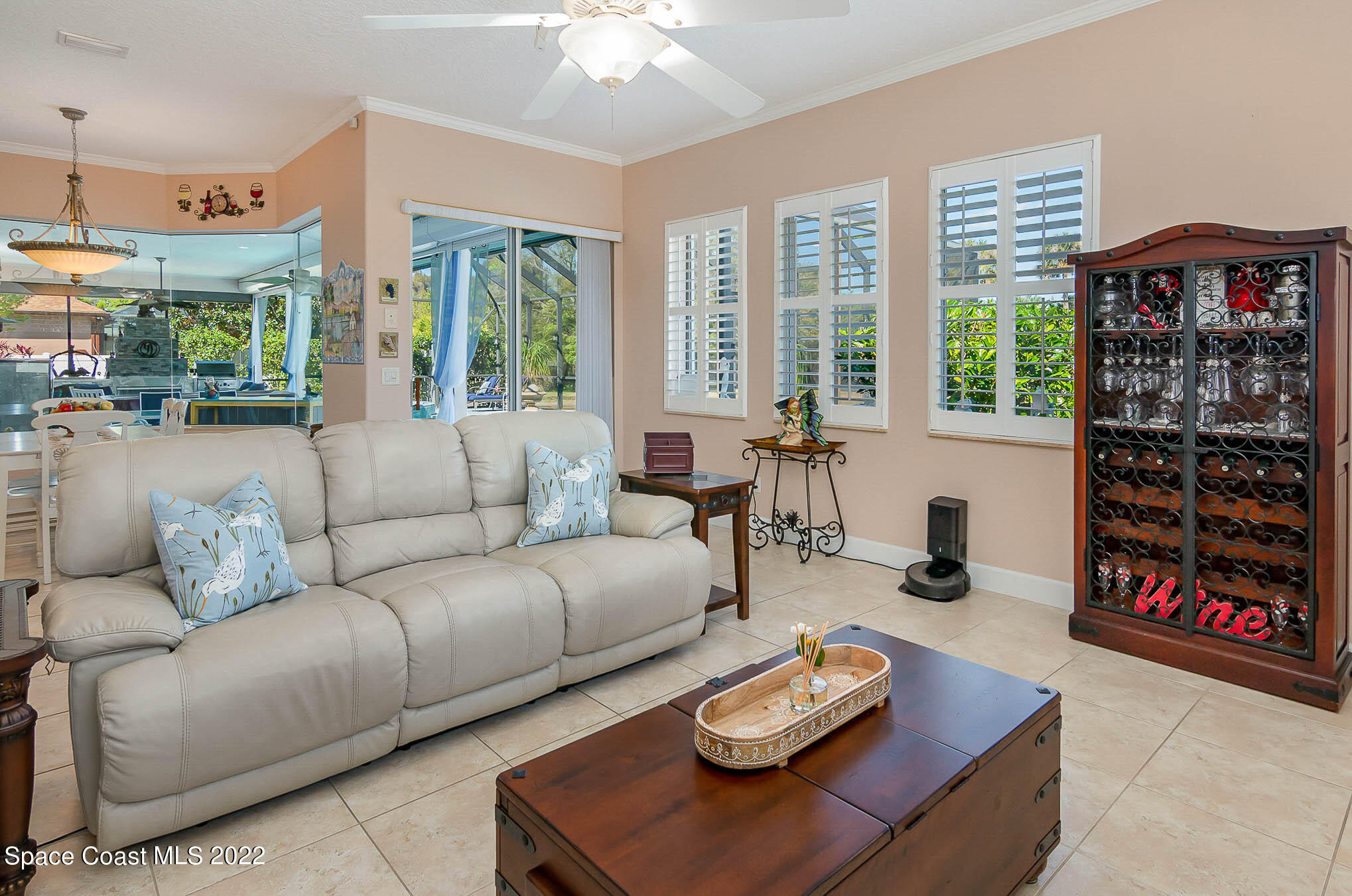 1338 Centennial Way Rockledge, FL 32955 - Photo 19 of 46 a living room with furniture and a large window