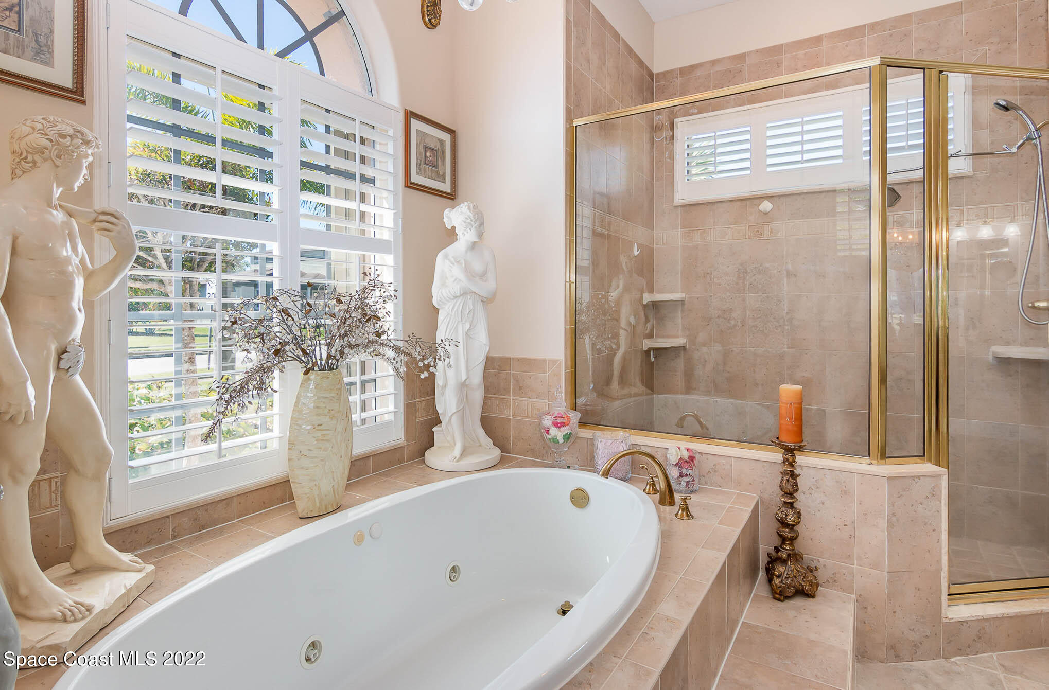 1338 Centennial Way Rockledge, FL 32955 - Photo 25 of 46 a bathroom with a tub and shower