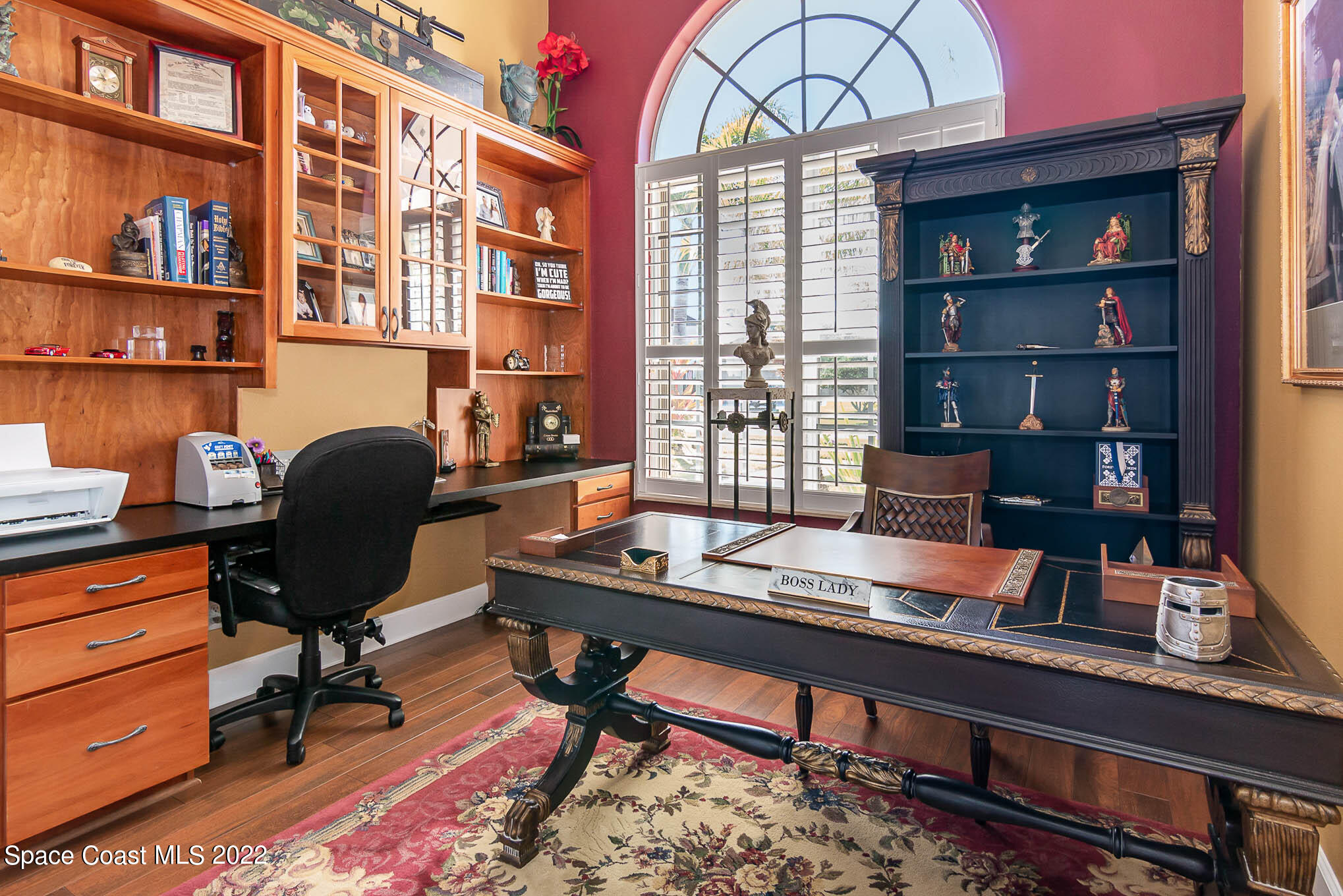 1338 Centennial Way Rockledge, FL 32955 - Photo 30 of 46 a work room with furniture and a bookshelf