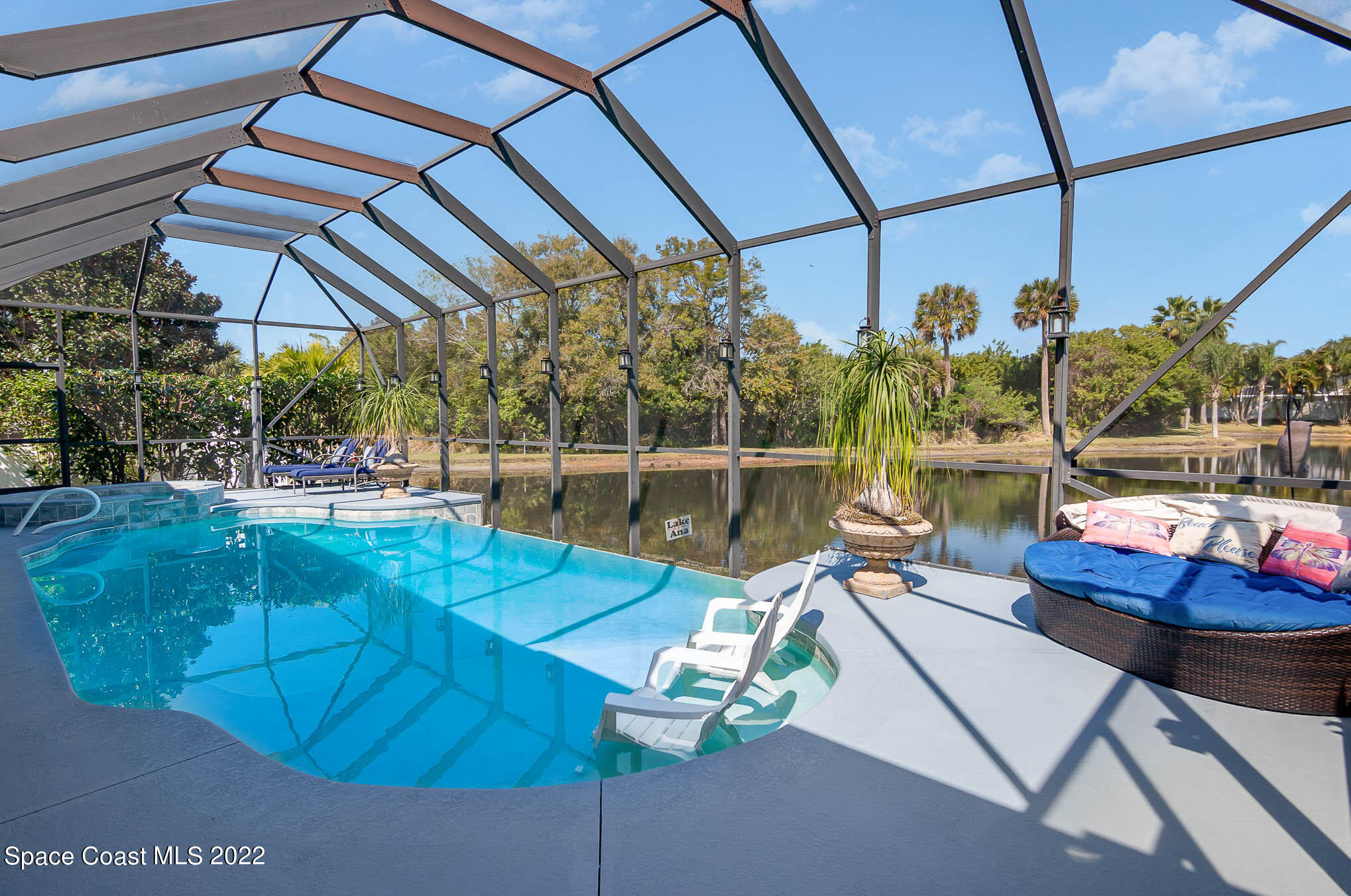 1338 Centennial Way Rockledge, FL 32955 - Photo 33 of 46 a view of a patio with a table and chairs