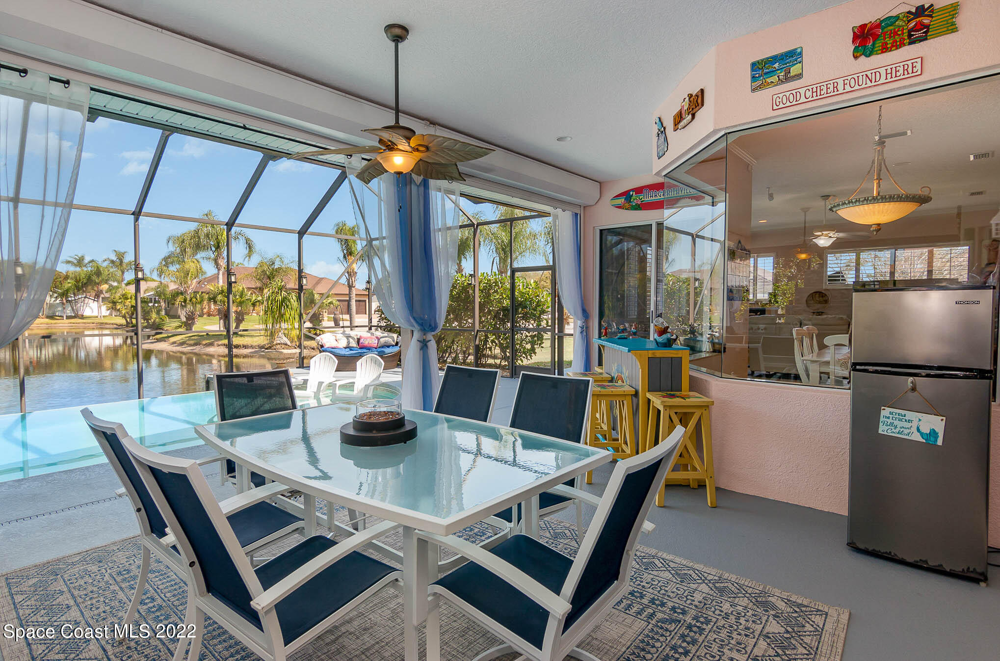 1338 Centennial Way Rockledge, FL 32955 - Photo 35 of 46 a dining room with furniture and window