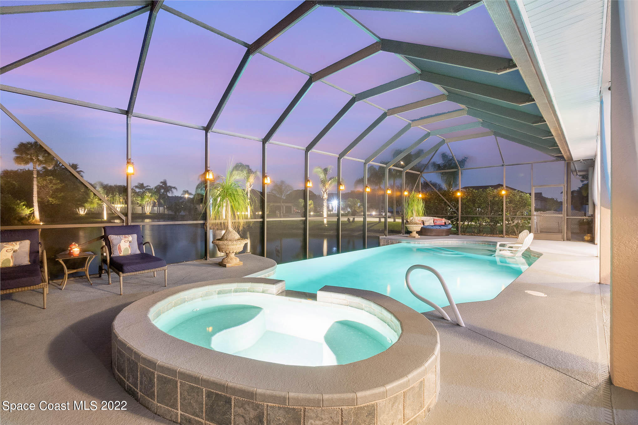 1338 Centennial Way Rockledge, FL 32955 - Photo 4 of 46 a view of a swimming pool with a patio
