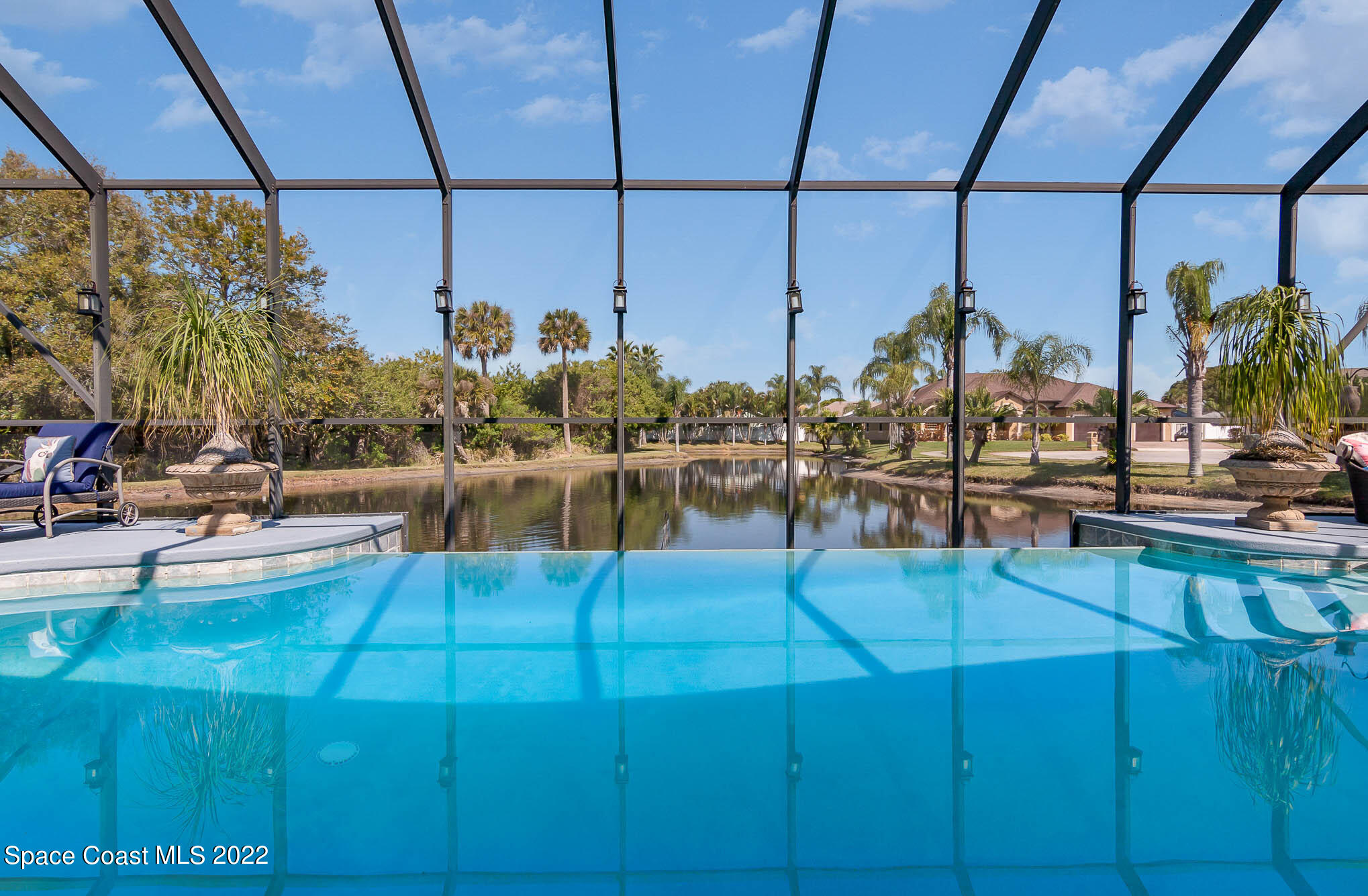 1338 Centennial Way Rockledge, FL 32955 - Photo 6 of 46 a view of swimming pool with outdoor seating
