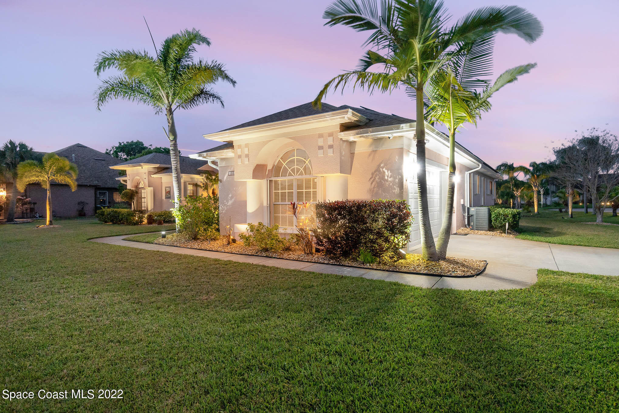 1338 Centennial Way Rockledge, FL 32955 - Photo 9 of 46 a front view of multiple houses with yard