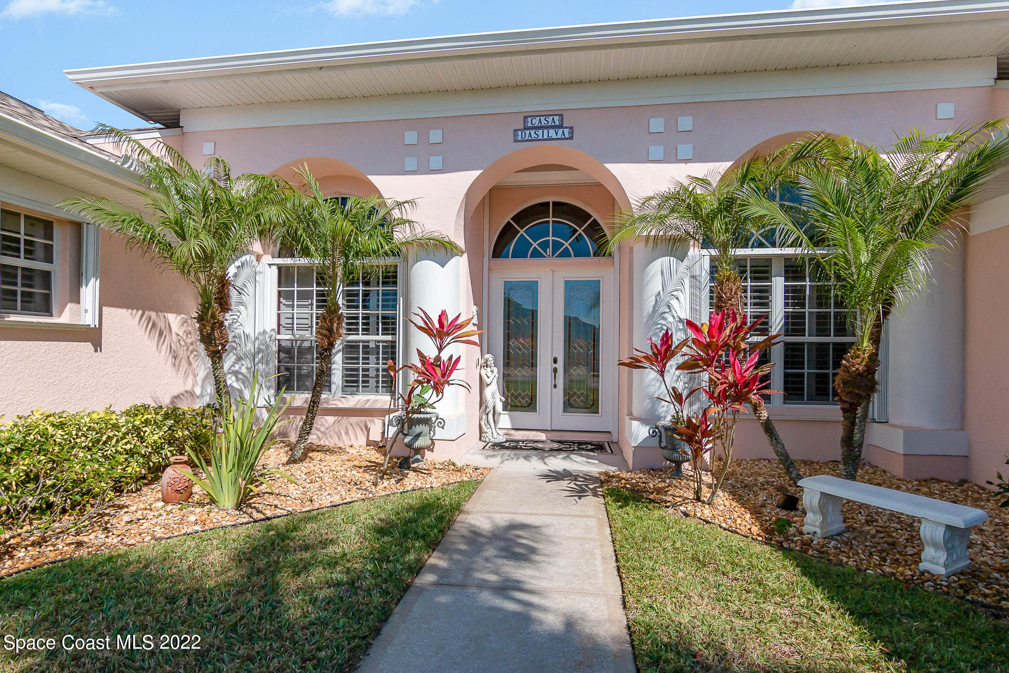 1338 Centennial Way Rockledge, FL 32955 - Photo 10 of 46 a front view of a house with garden