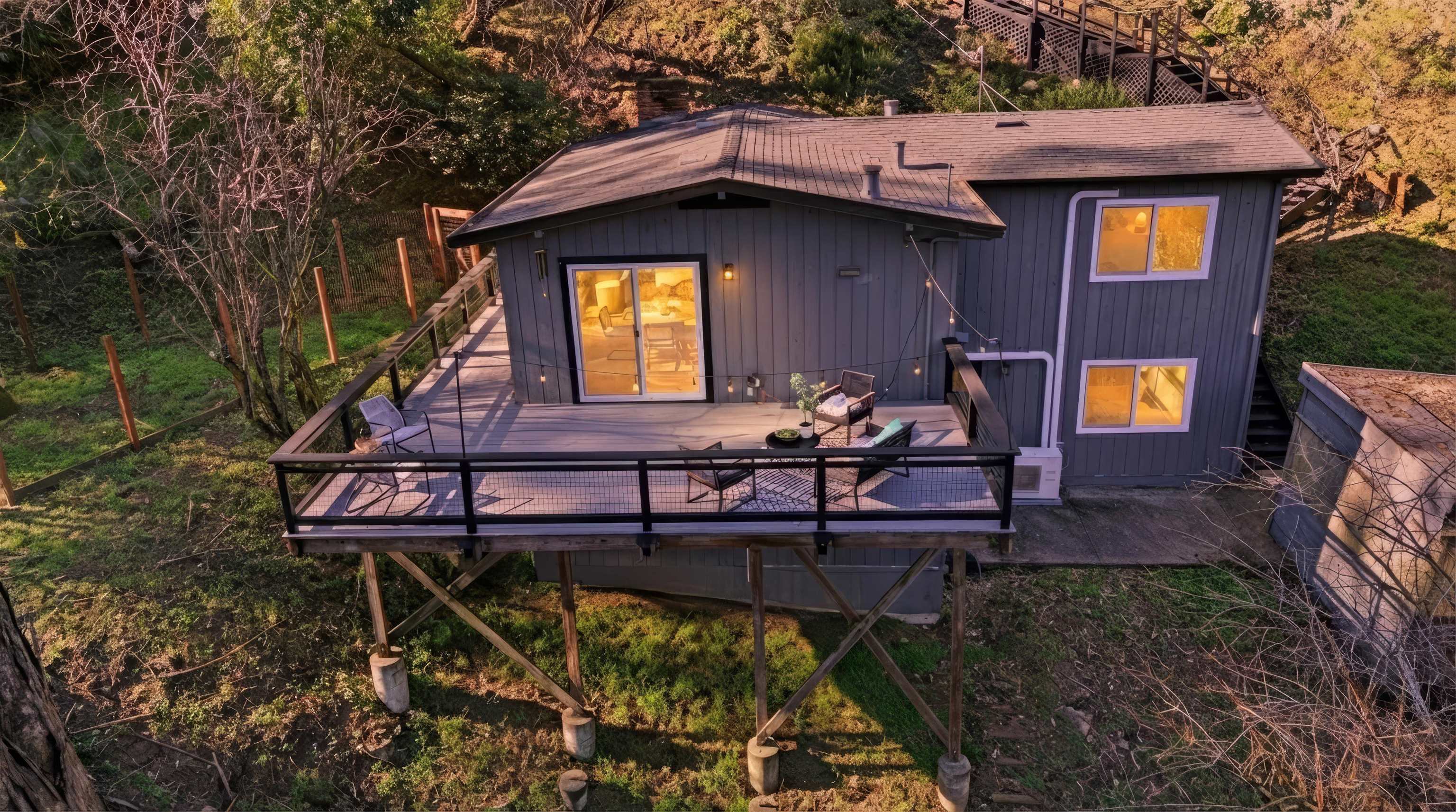 6416 Valley View Road Oakland, CA 94611 - Photo 1 of 58 a view of a chairs setting on the roof deck