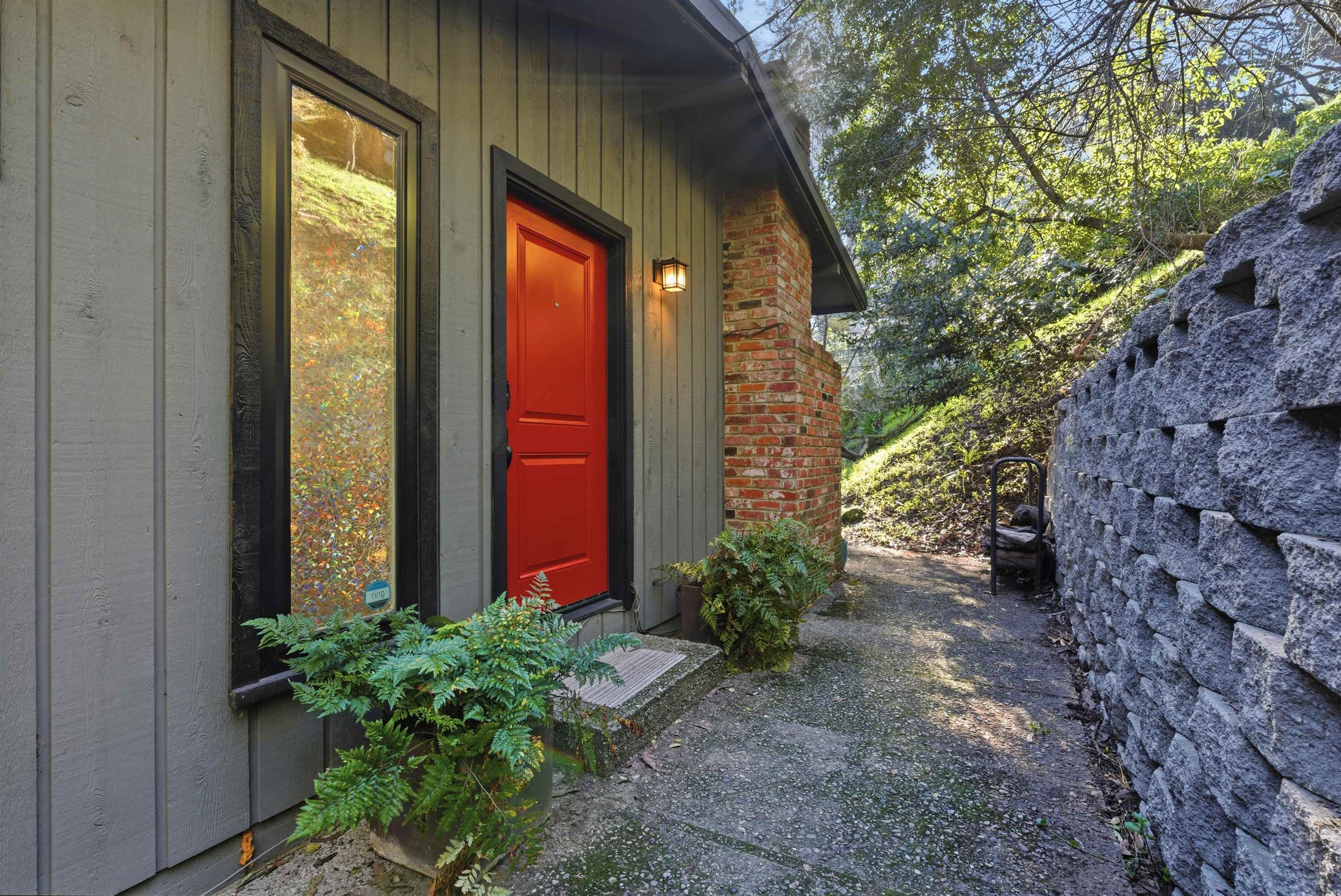 6416 Valley View Road Oakland, CA 94611 - Photo 2 of 58 a view of a pathway with a house in front of it