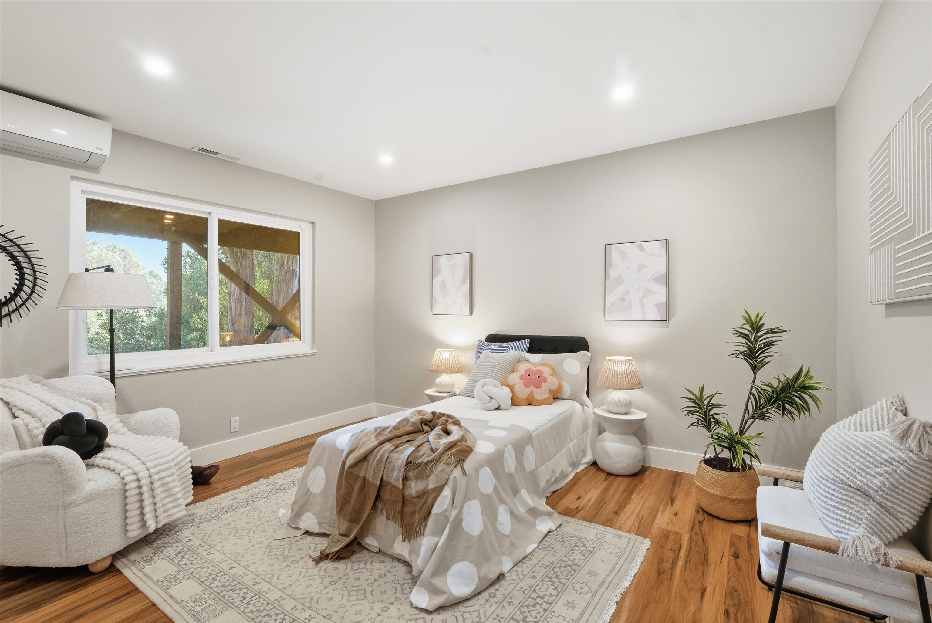 6416 Valley View Road Oakland, CA 94611 - Photo 23 of 58 a bedroom with a bed and windows