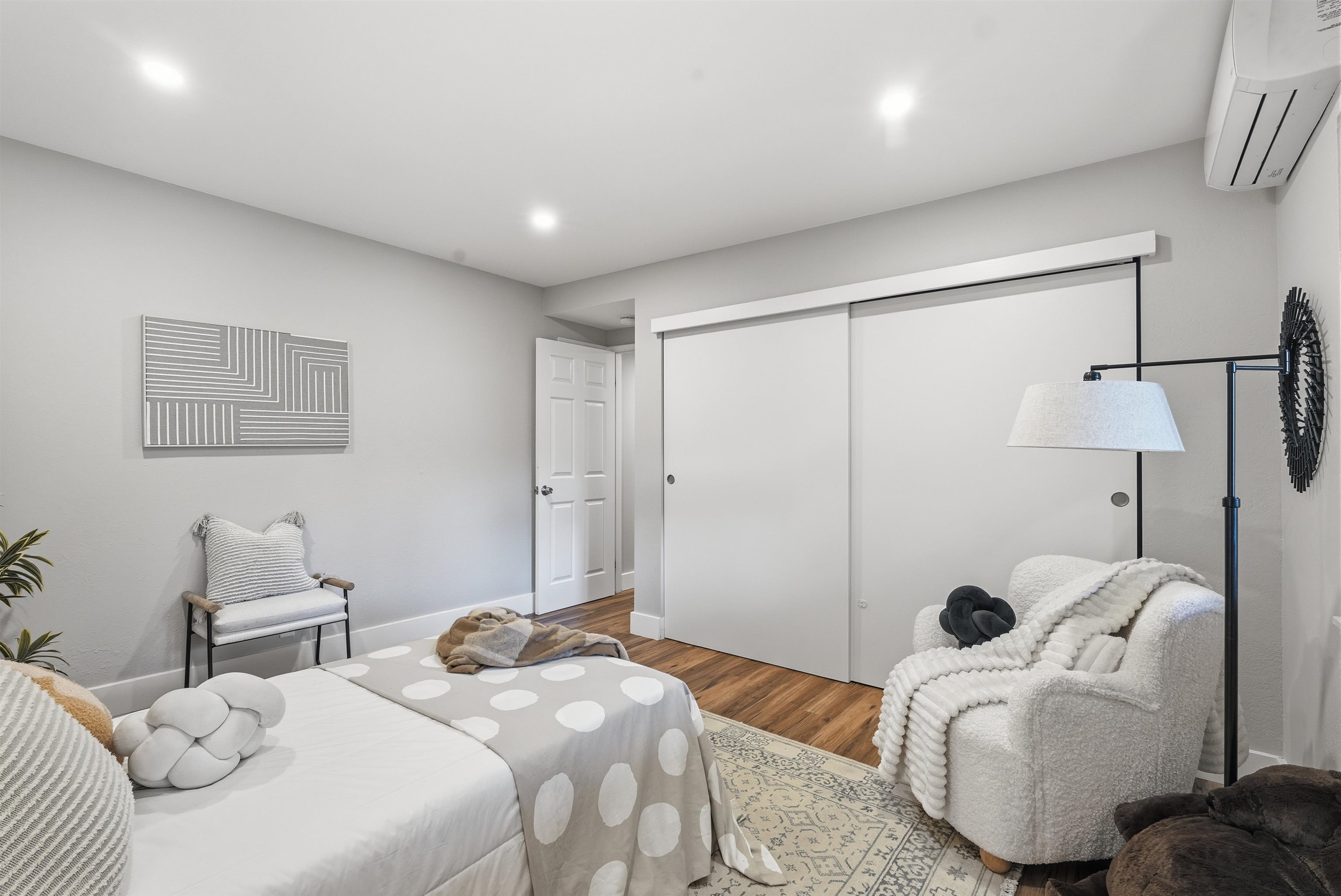 6416 Valley View Road Oakland, CA 94611 - Photo 24 of 58 a bedroom with two beds and a couch