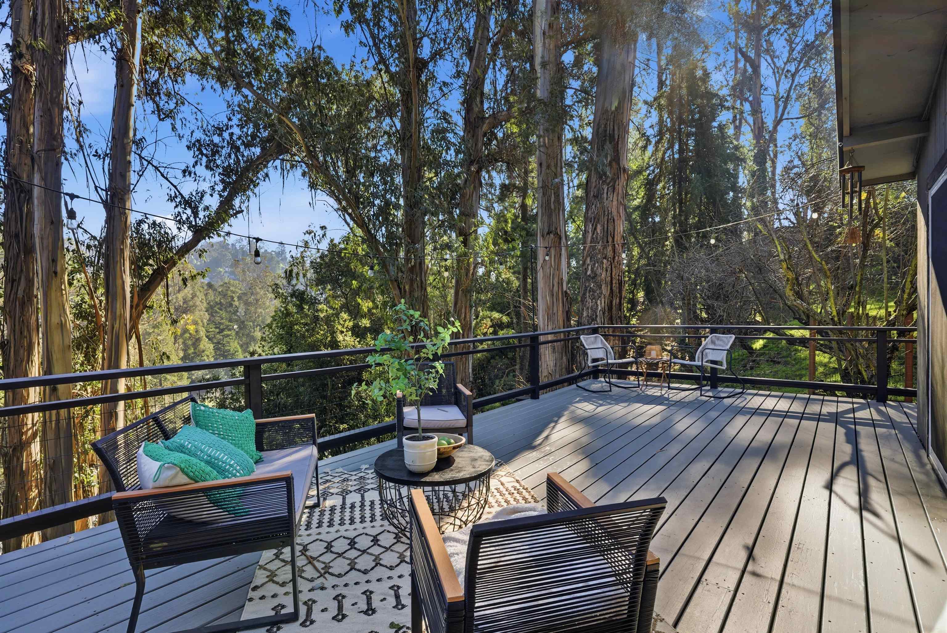 6416 Valley View Road Oakland, CA 94611 - Photo 41 of 58 a view of balcony with furniture and wooden floor