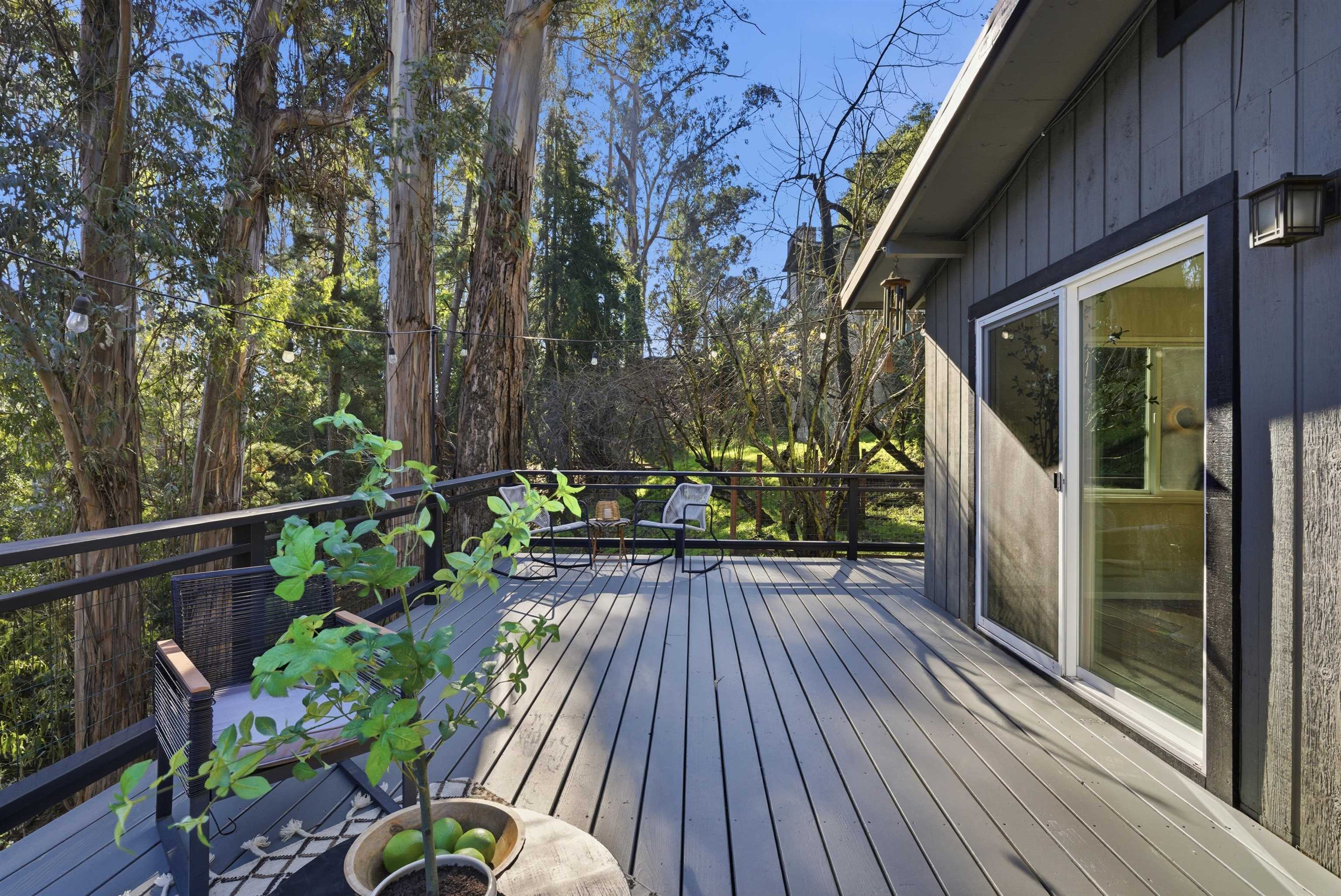 6416 Valley View Road Oakland, CA 94611 - Photo 43 of 58 a view of a house with backyard and sitting area