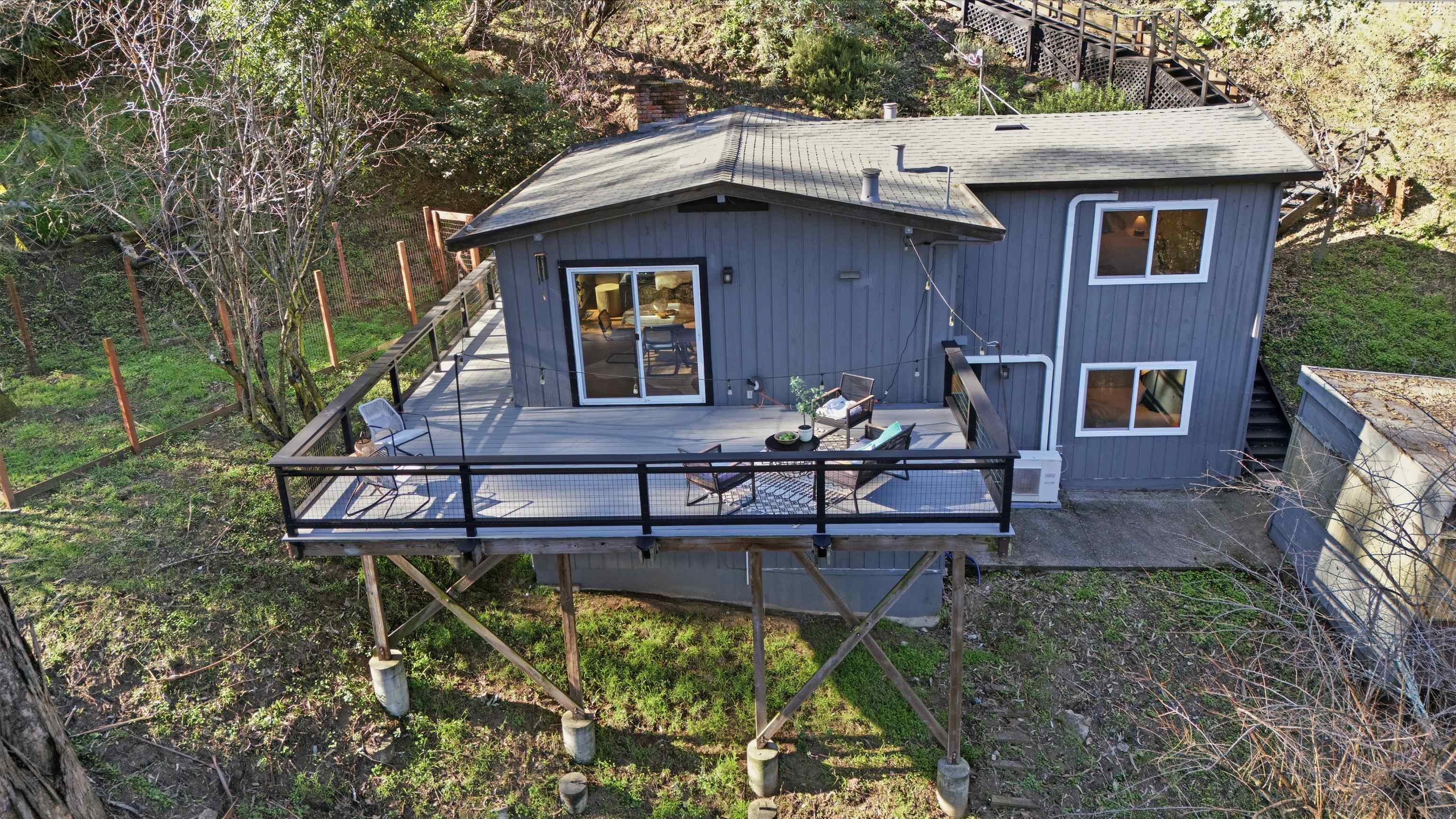 6416 Valley View Road Oakland, CA 94611 - Photo 44 of 58 a house view with a sitting space fire pit and outdoor space