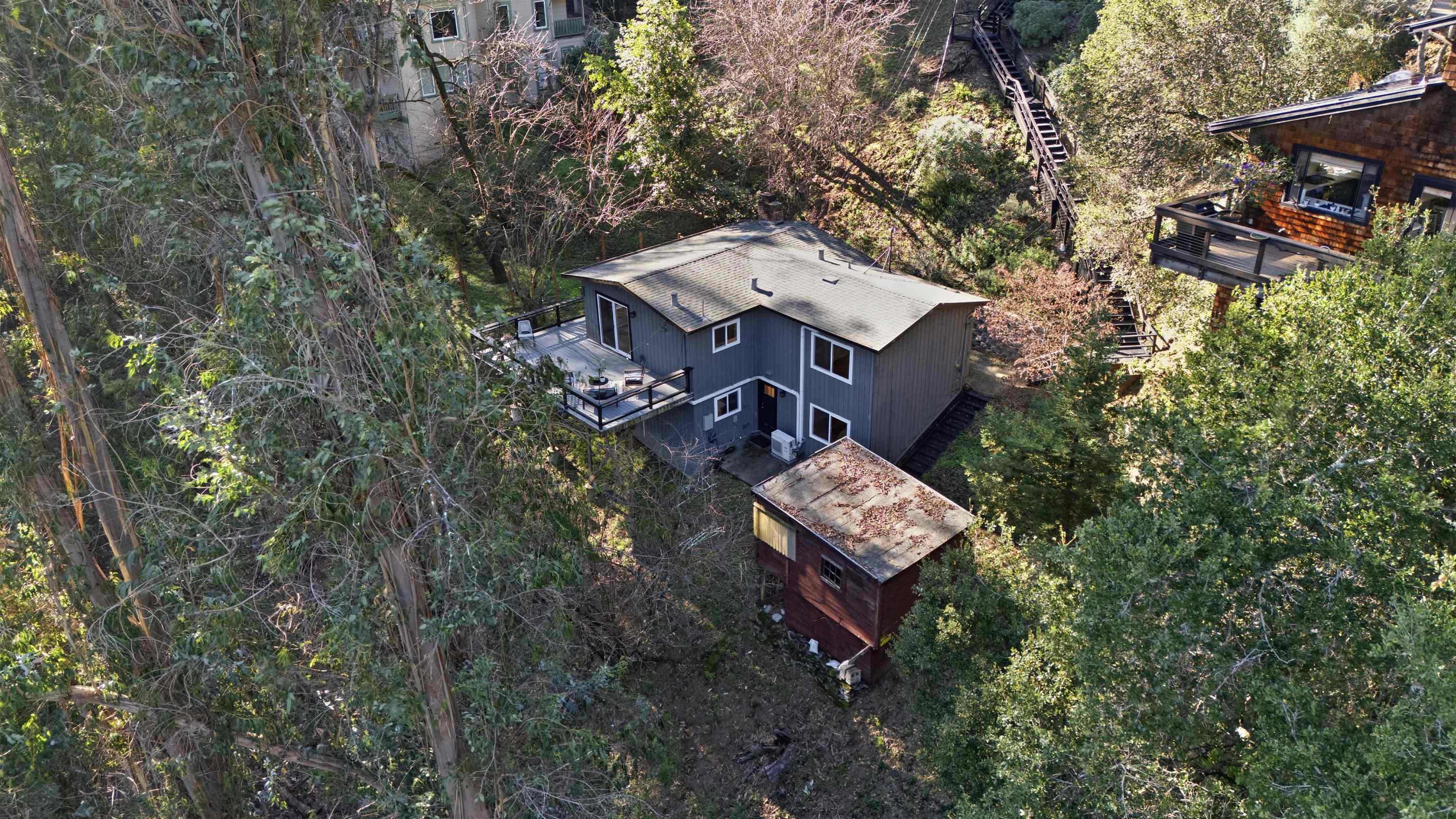 6416 Valley View Road Oakland, CA 94611 - Photo 46 of 58 an aerial view of a house with a yard