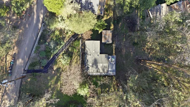 a view of balcony with wooden floor and outdoor seating