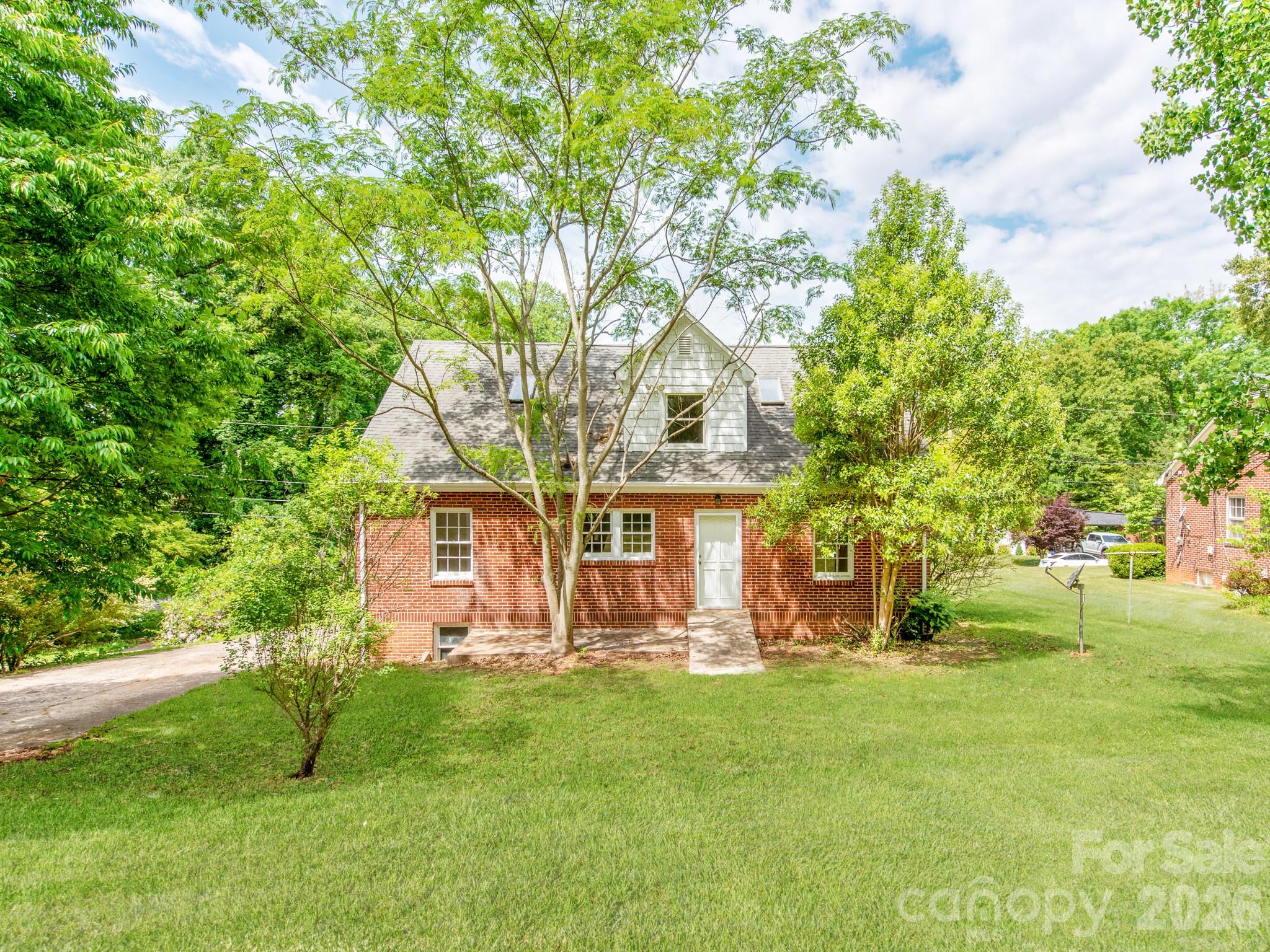 113 Falls Street Morganton, NC 28655 - Photo 30 of 33 a front view of a house with a yard