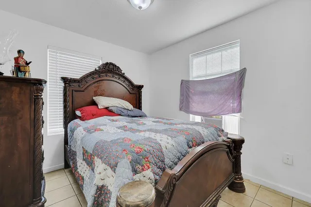 a bedroom with a bed and furniture