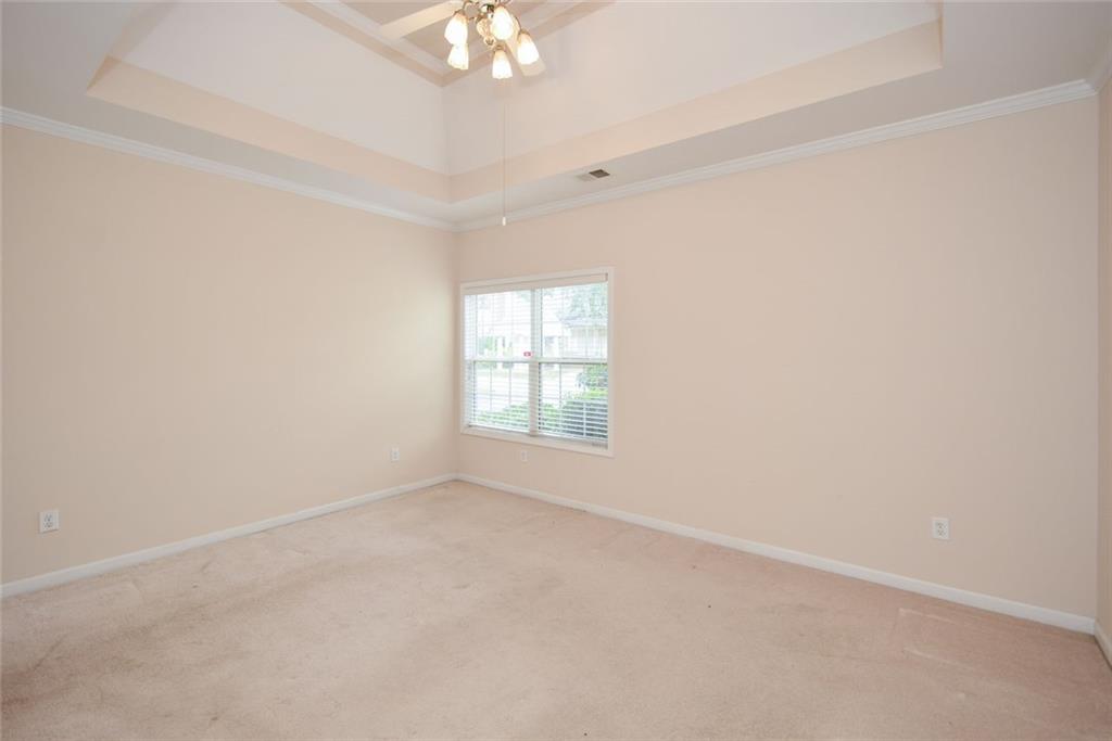 1471 Settlers Walk Way, Unit 5 Marietta, GA 30060 - Photo 20 of 29 an empty room with a window