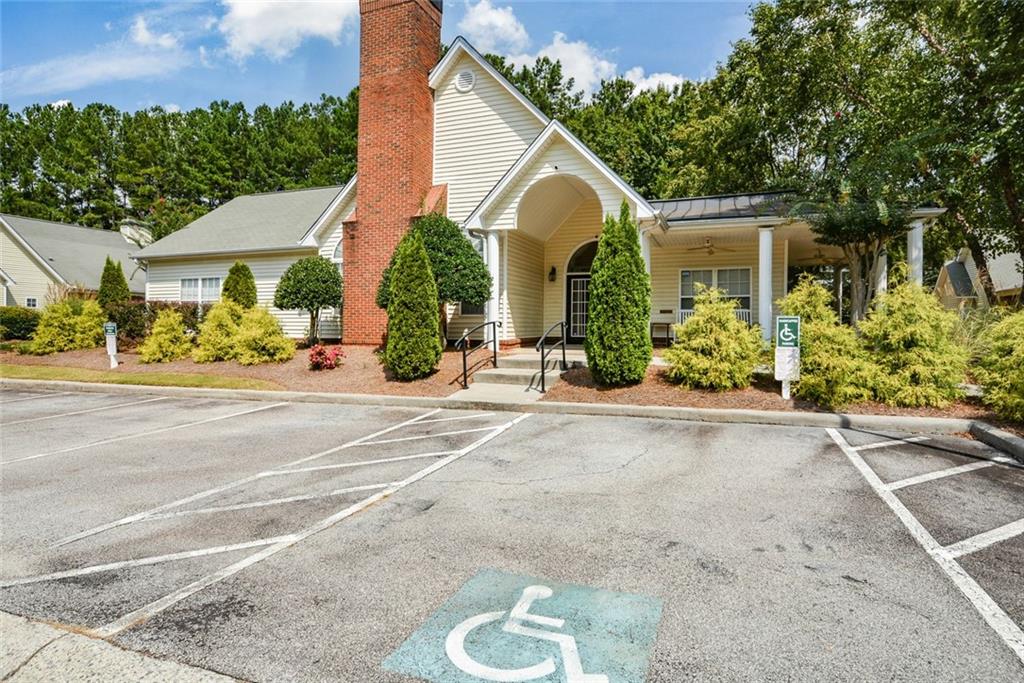1471 Settlers Walk Way, Unit 5 Marietta, GA 30060 - Photo 25 of 29 front view of a house with a street