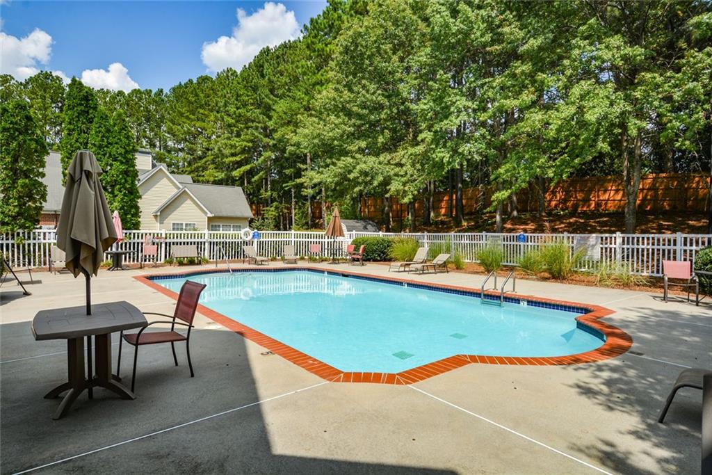1471 Settlers Walk Way, Unit 5 Marietta, GA 30060 - Photo 27 of 29 swimming pool view with a outdoor seating