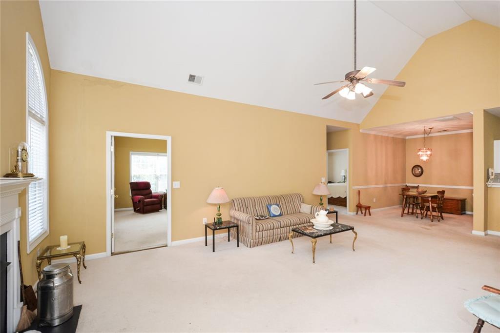 1471 Settlers Walk Way, Unit 5 Marietta, GA 30060 - Photo 7 of 29 a living room with furniture