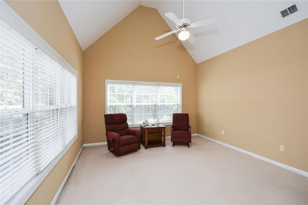 1471 Settlers Walk Way, Unit 5 Marietta, GA 30060 - Photo 8 of 29 a living room with furniture and a window