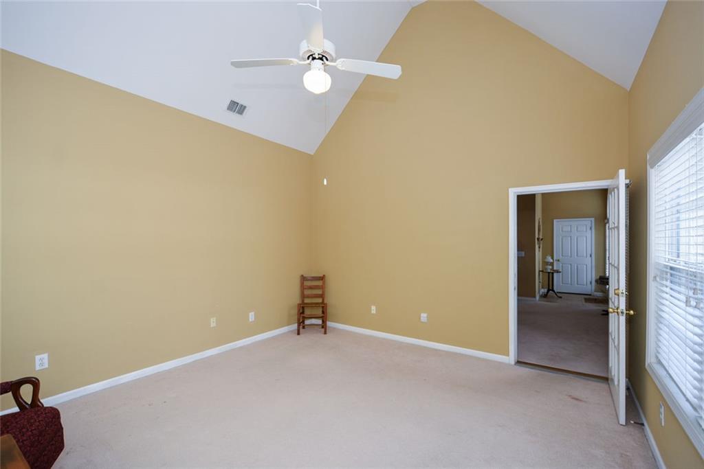 1471 Settlers Walk Way, Unit 5 Marietta, GA 30060 - Photo 10 of 29 wooden floor in an empty room