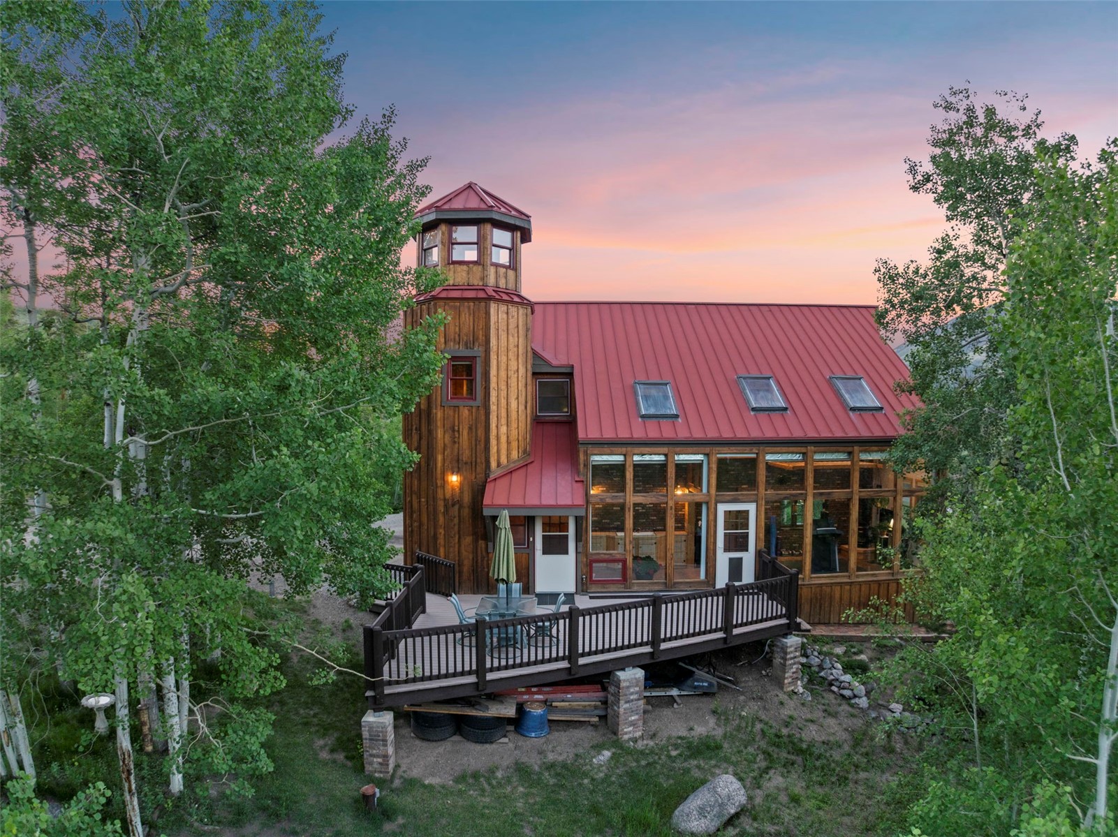 1516 Blue Ridge Road Silverthorne, CO 80498 - Photo 7 of 50 Rear view of property with a standing seam roof, a metal roof, and a deck