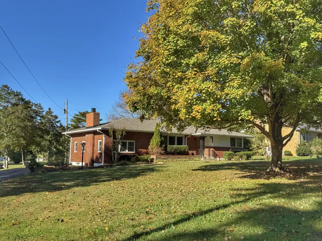a front view of a building with swimming pool
