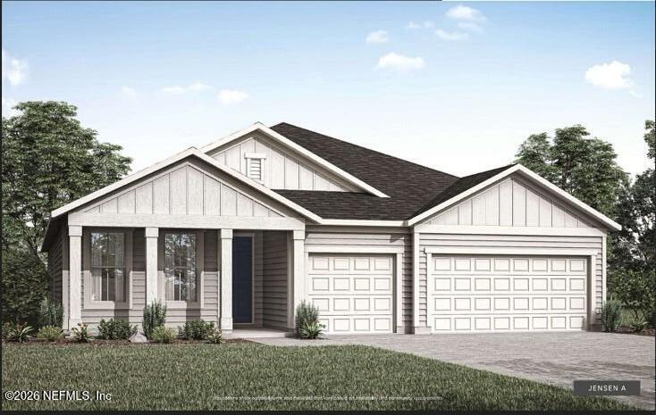 1032 Creighton Road Fleming Island, FL 32003 - Photo 1 of 1 a front view of a house with a yard