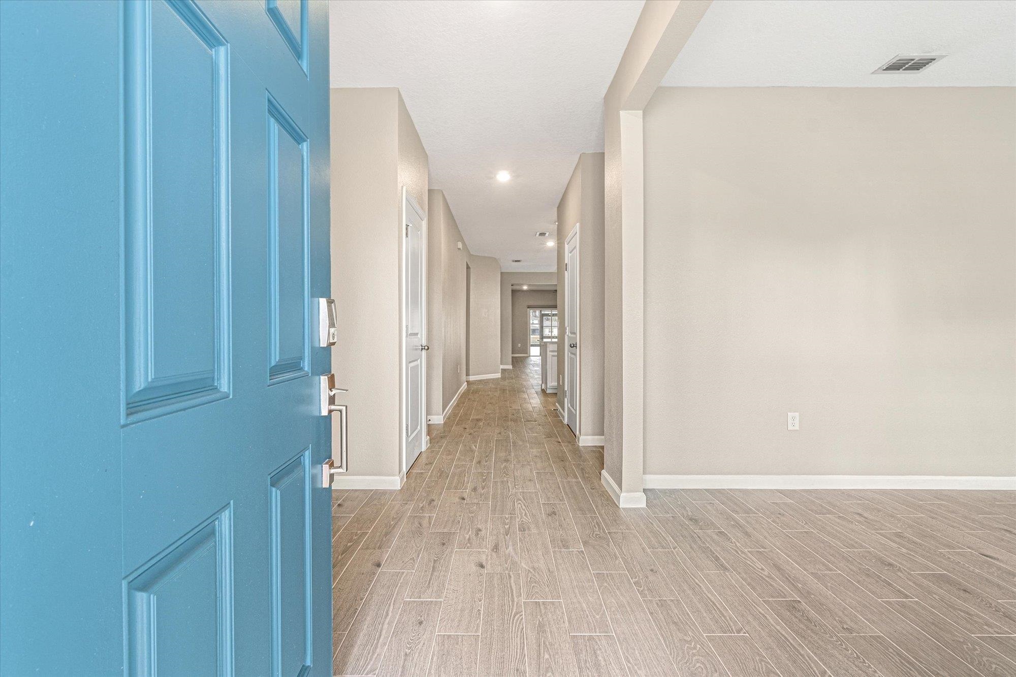 204 Field Flower Way St. Augustine, FL 32092 - Photo 11 of 60 a view of a hallway with wooden floor