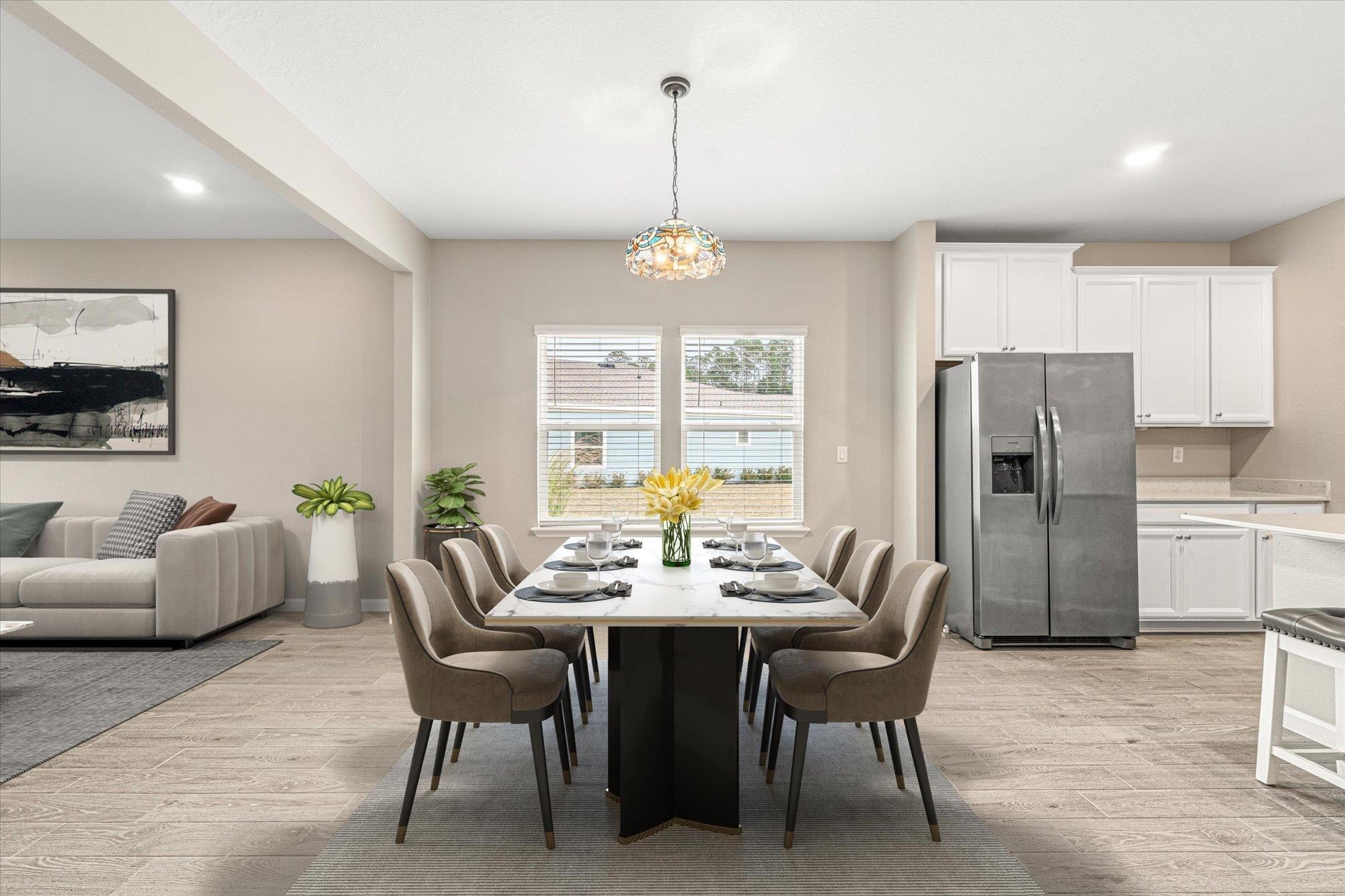 204 Field Flower Way St. Augustine, FL 32092 - Photo 17 of 60 a dining room with furniture a chandelier and window