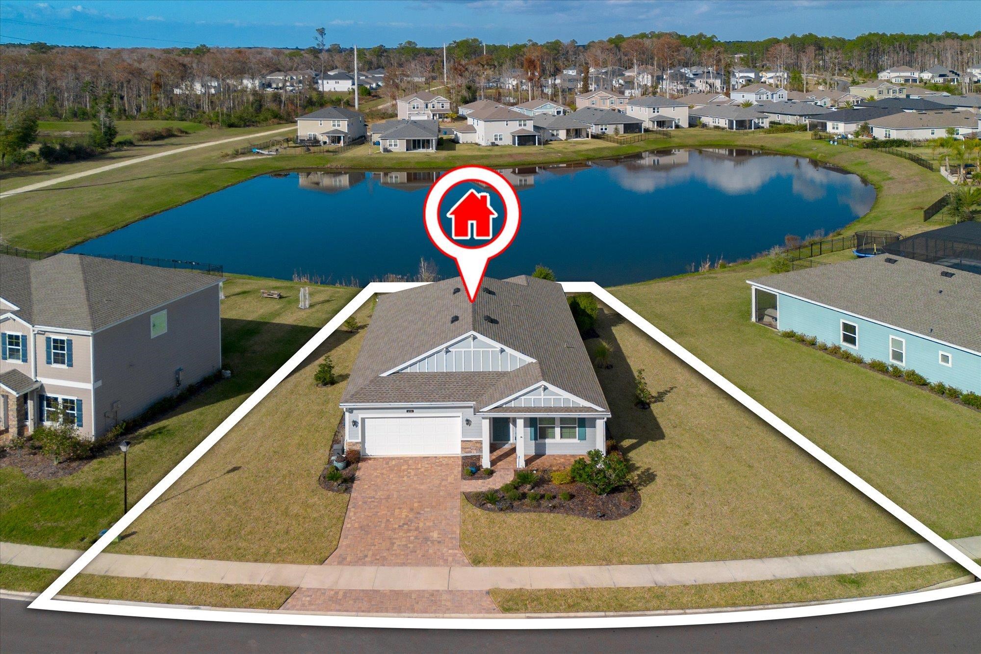 204 Field Flower Way St. Augustine, FL 32092 - Photo 2 of 60 Aerial view of residential area featuring a large body of water