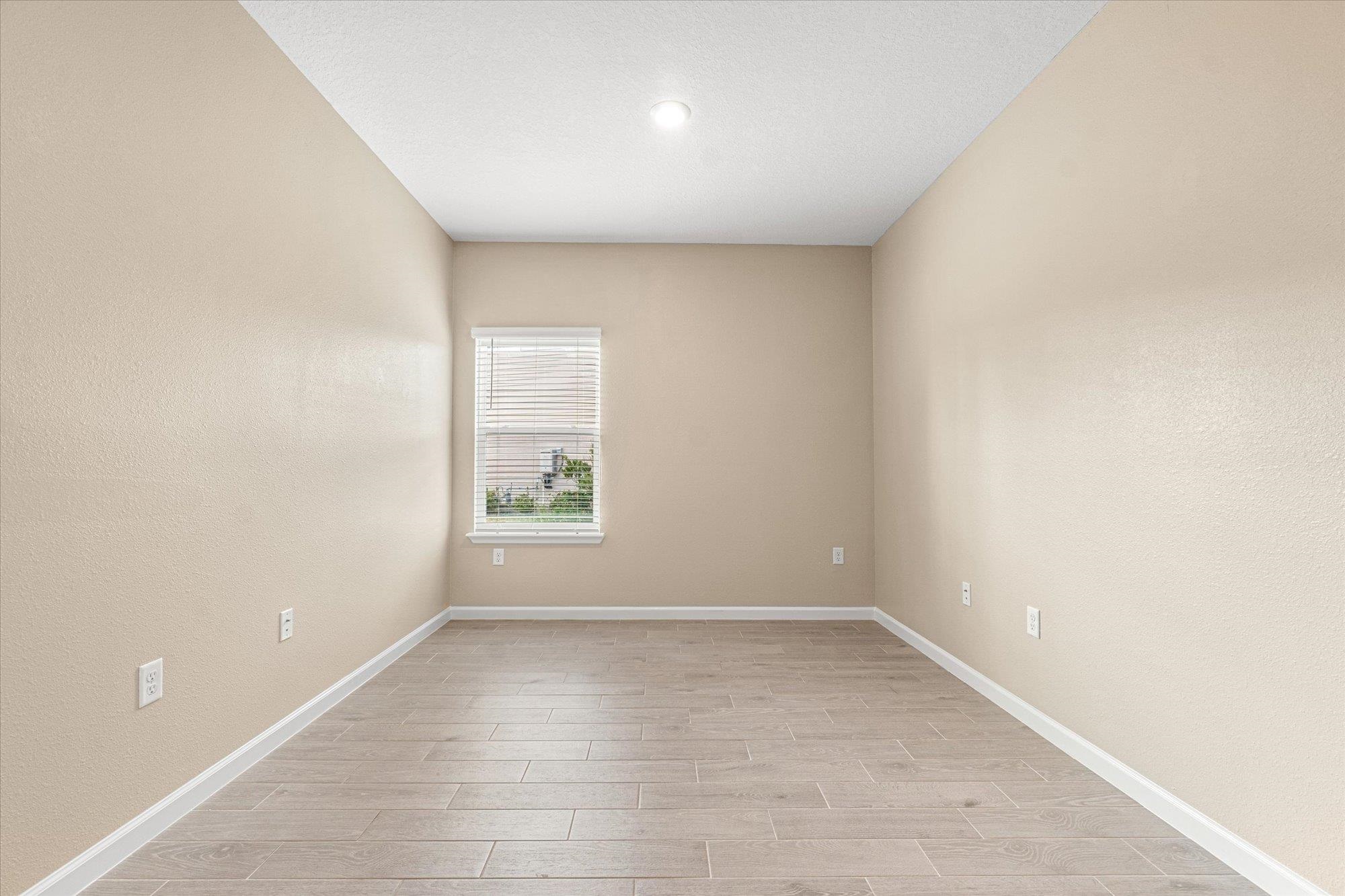 204 Field Flower Way St. Augustine, FL 32092 - Photo 24 of 60 an empty room with a window