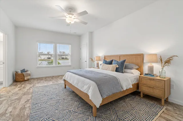 a bathroom with a shower and a window
