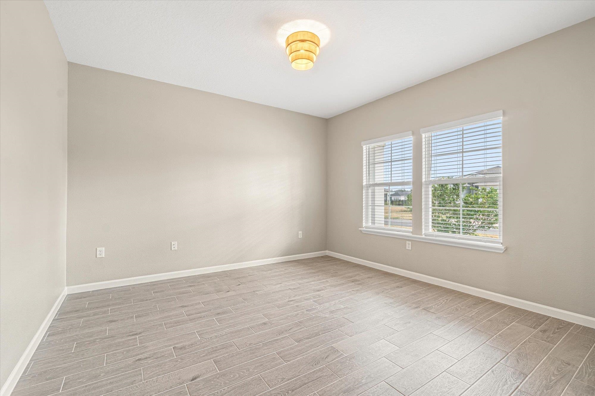 204 Field Flower Way St. Augustine, FL 32092 - Photo 42 of 60 a view of an empty room with a window