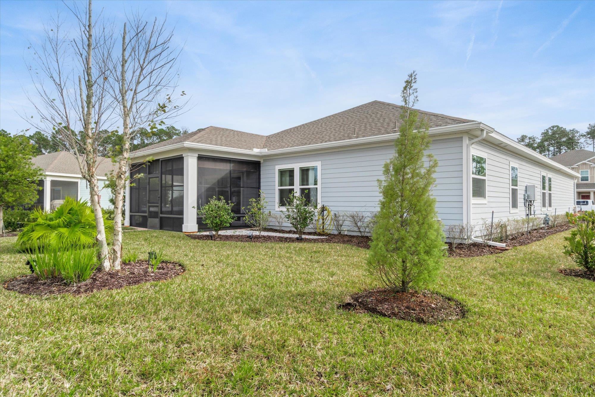 204 Field Flower Way St. Augustine, FL 32092 - Photo 47 of 60 a front view of house with yard and green space