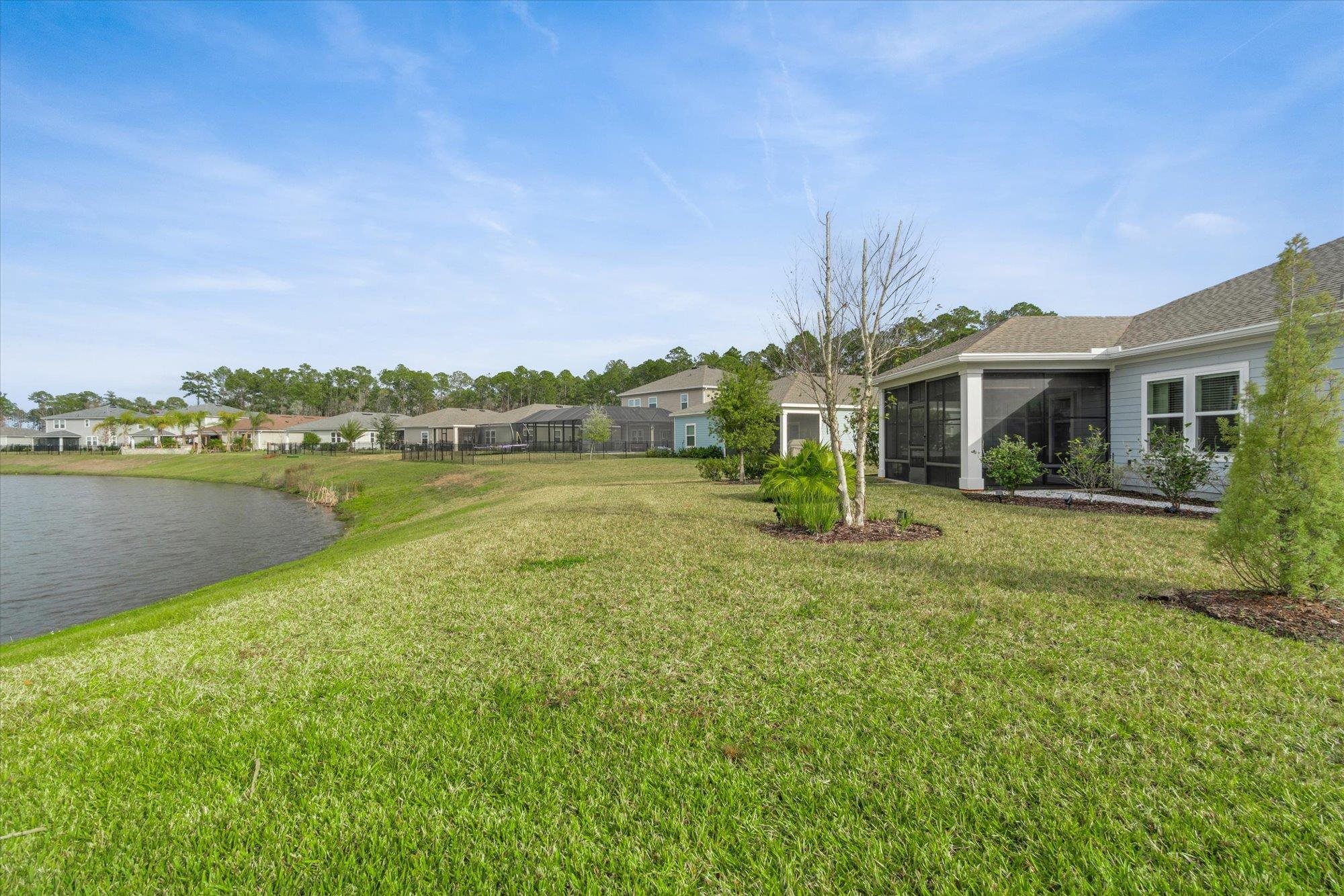 204 Field Flower Way St. Augustine, FL 32092 - Photo 50 of 60 a view of a house with a yard and sitting area