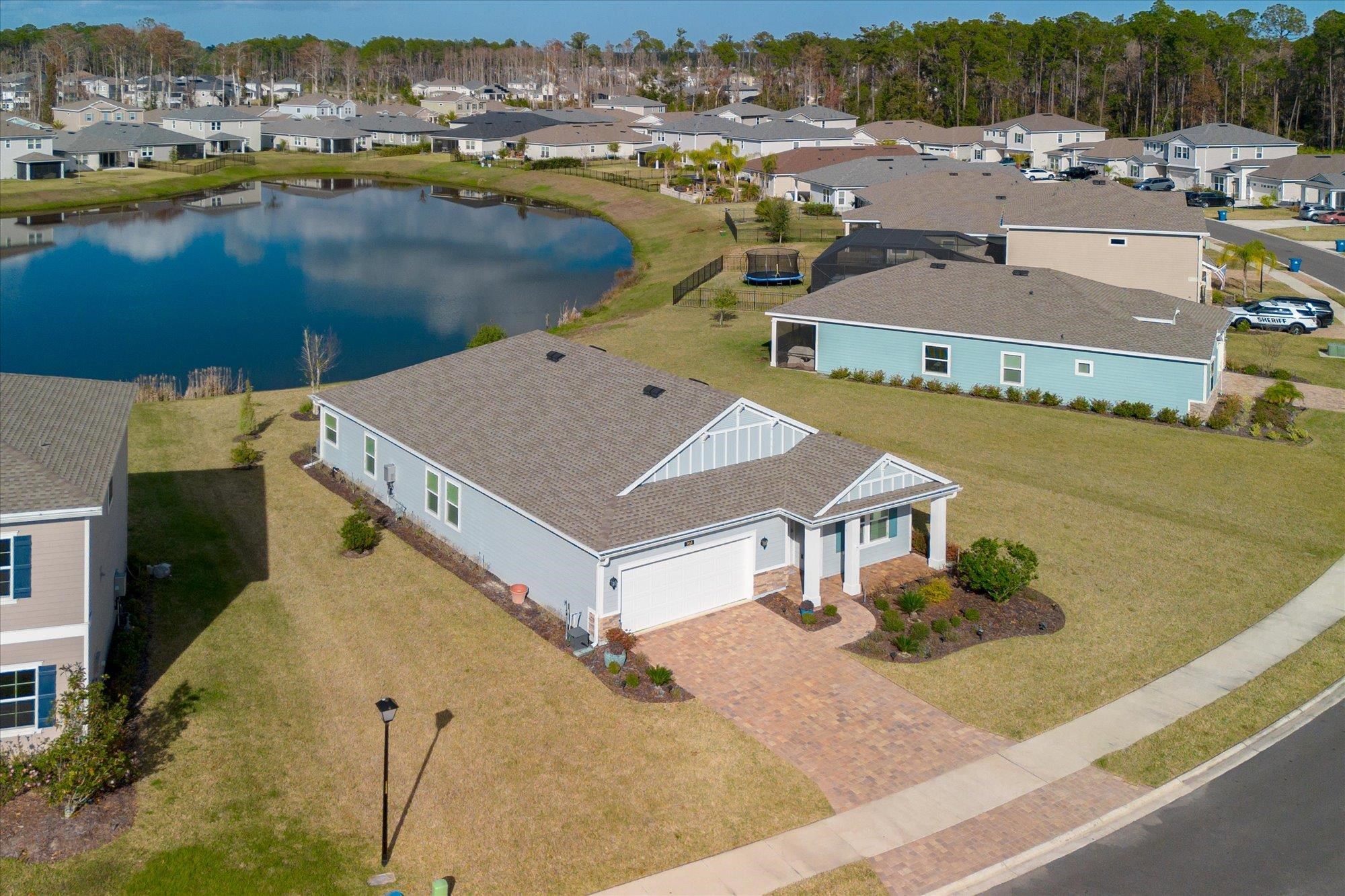 204 Field Flower Way St. Augustine, FL 32092 - Photo 54 of 60 an aerial view of a house with a lake view